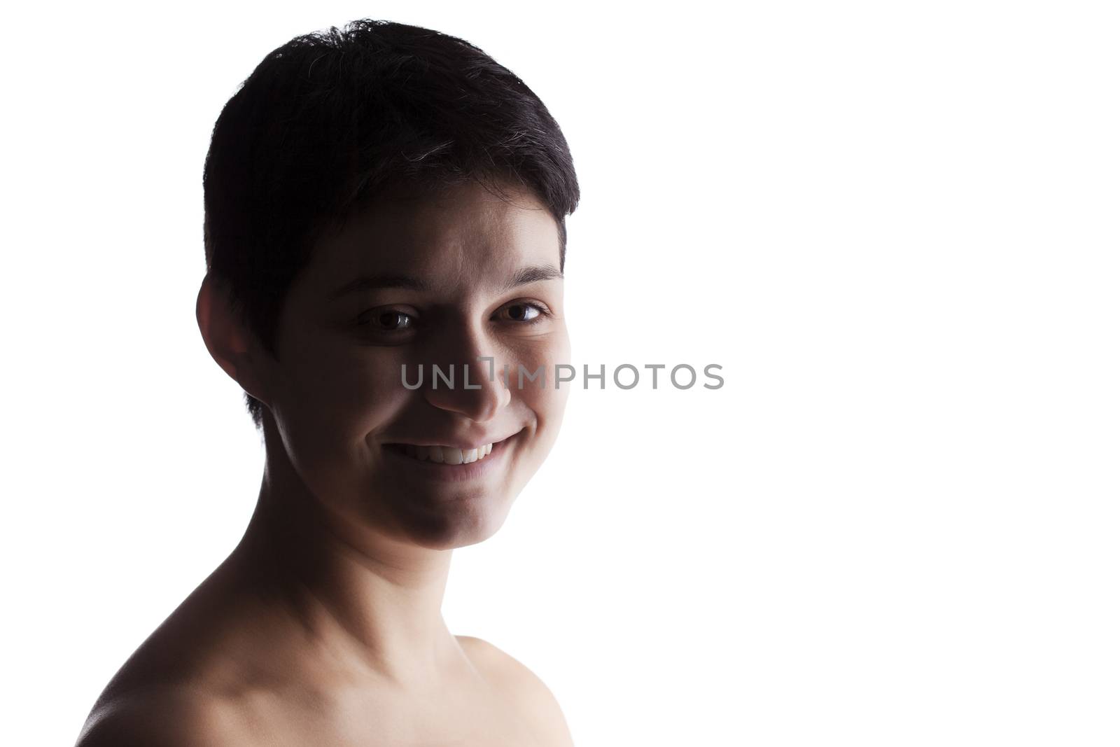 portrait of a girl with a short hair looking at camera, smiling