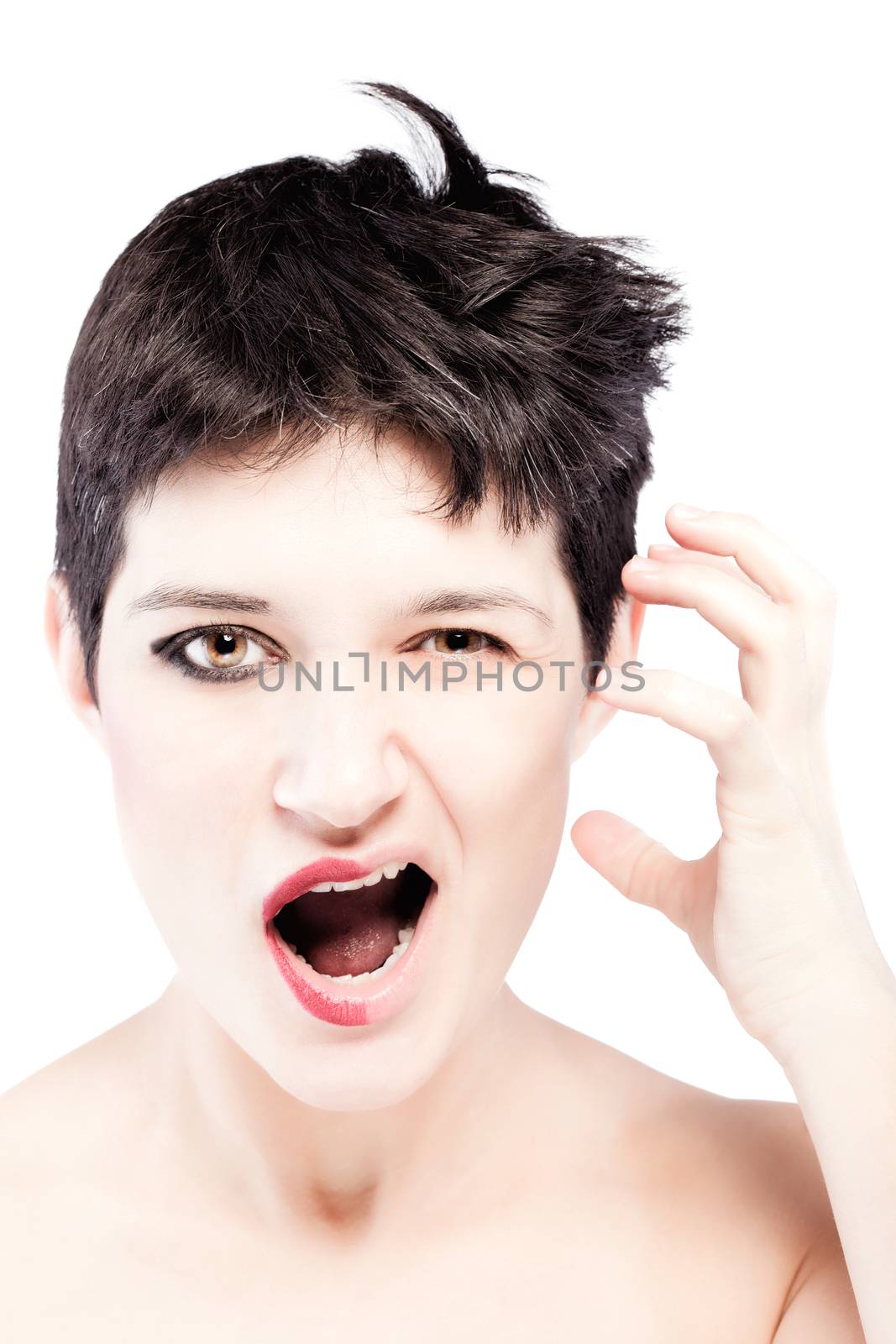 girl with a short hair, having half her face with make up, strange expression