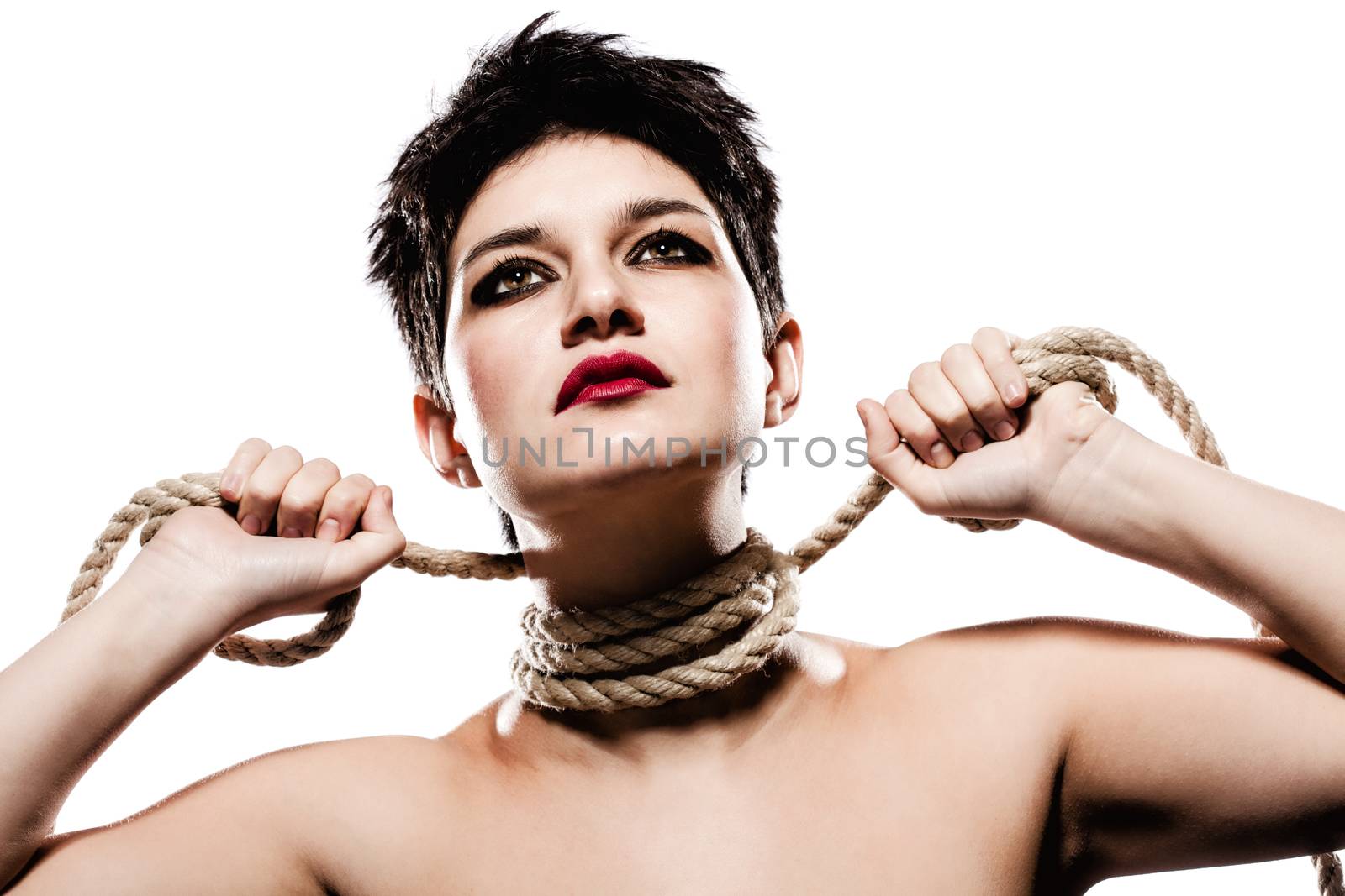 girl with short hair, having rope around her neck, looking up