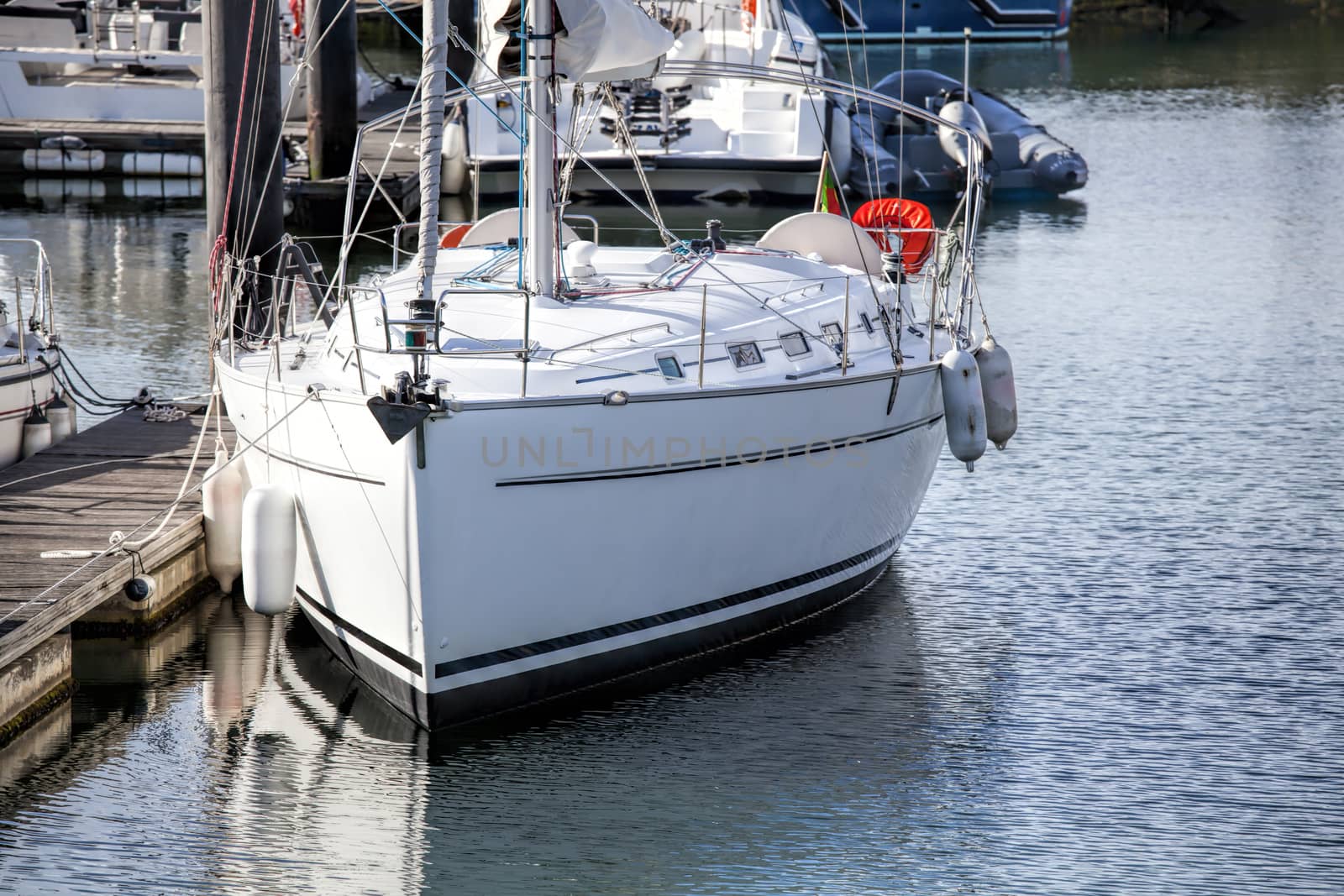 Beautiful white modern yachts at sea port 