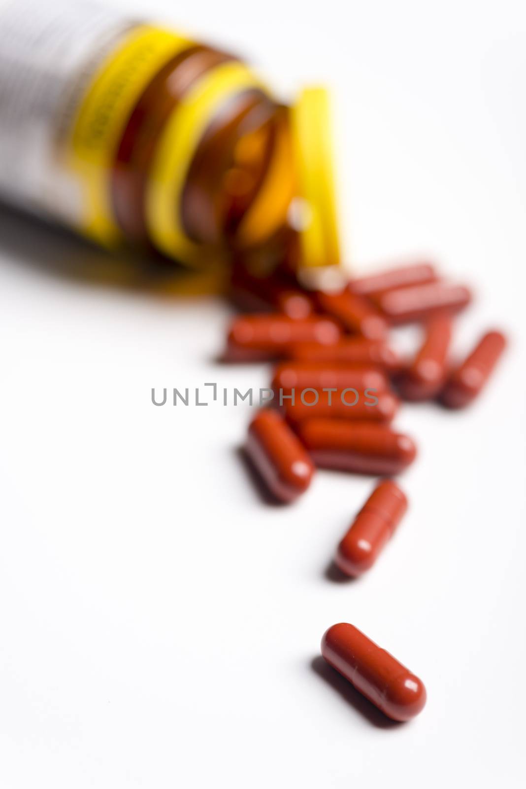 Pills and medicine over a white board