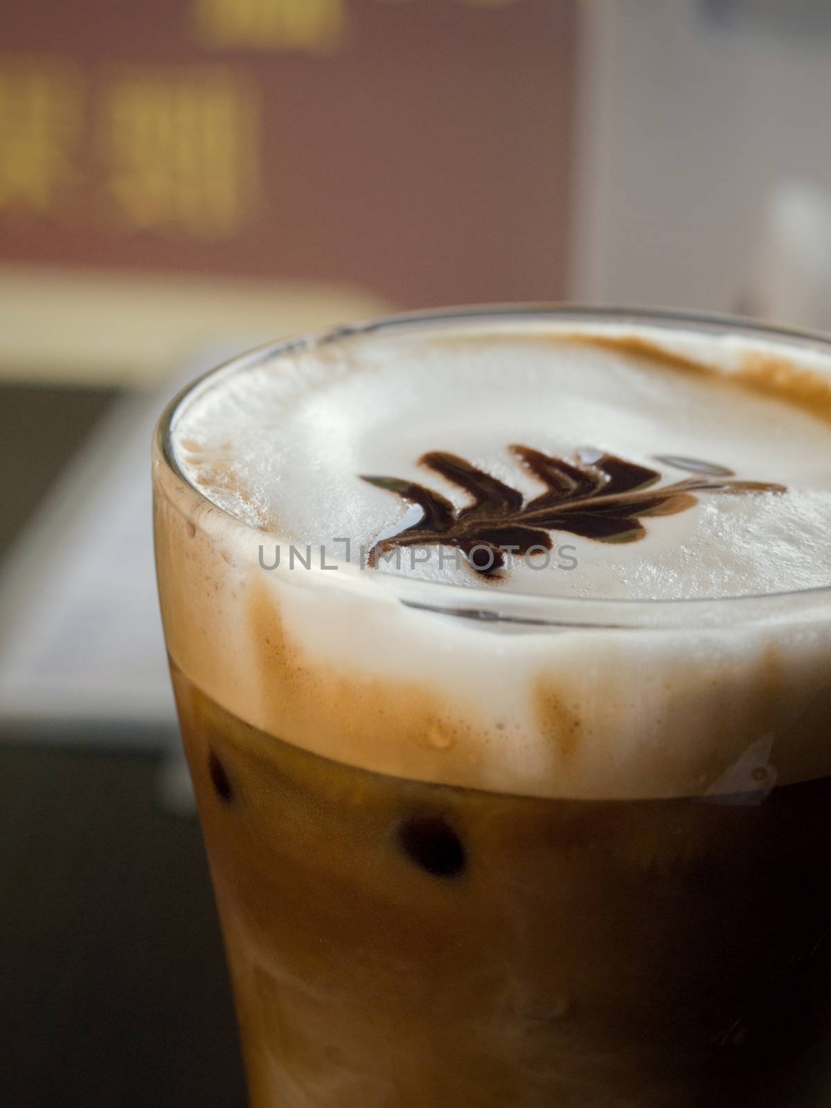COLOR PHOTO OF ICED CAPPUCCINO WITH LATTE ART