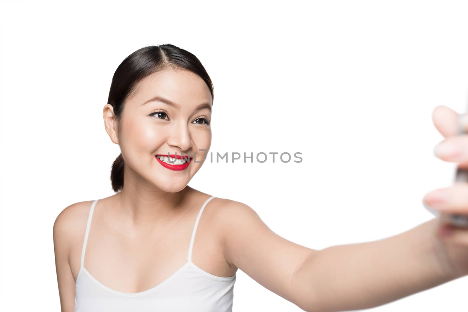 Beautiful asian woman with retro makeup taking selfie photo isolated on white background.