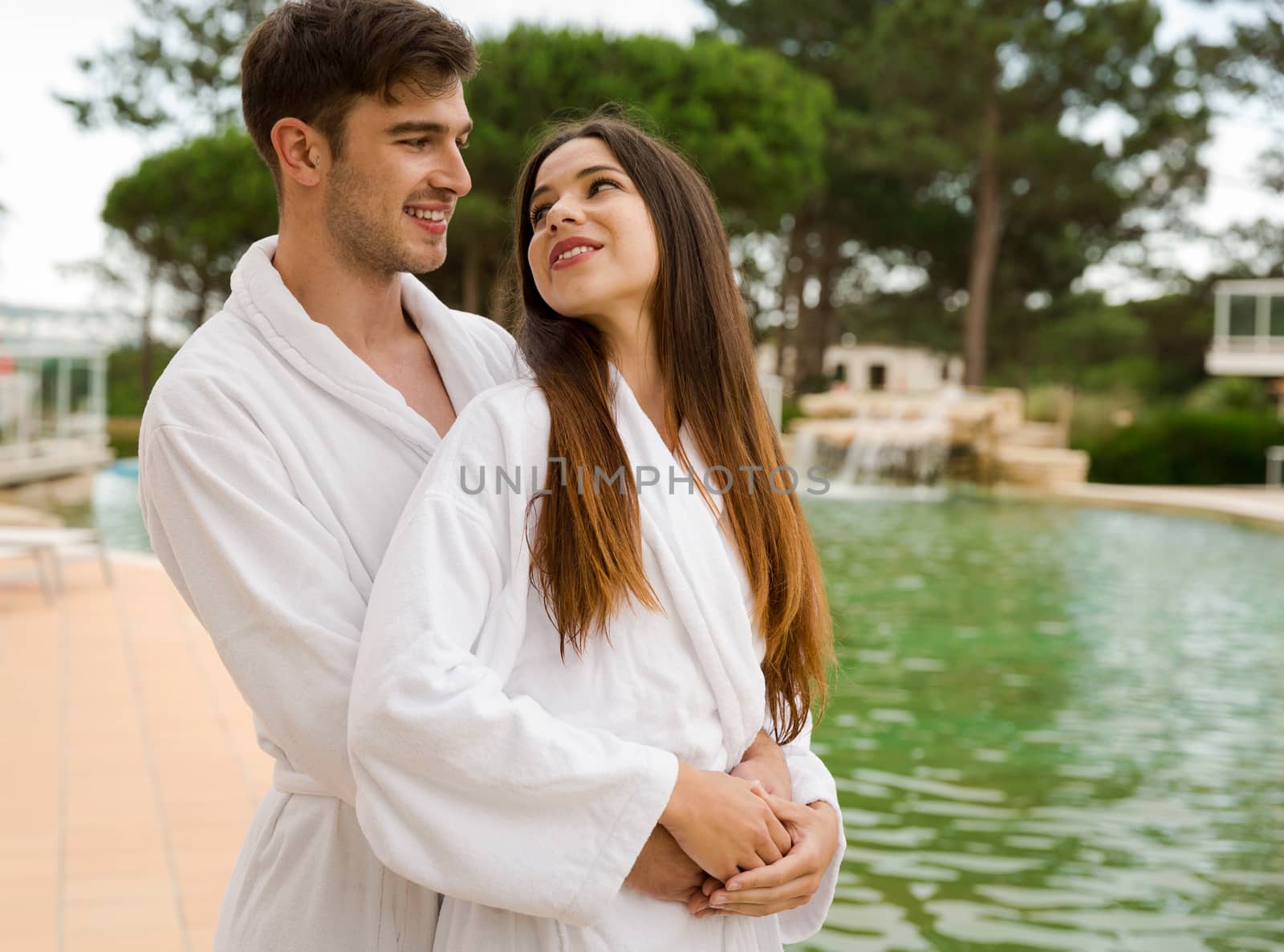 Young couple enjoying vacations in a hotel