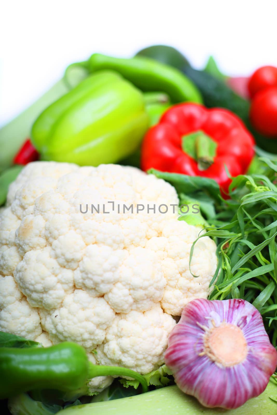 Pile of vegetables isolated on white background with copy space