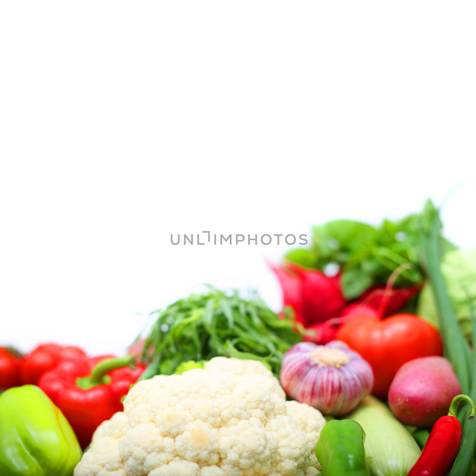 Pile of vegetables isolated on white background with copy space