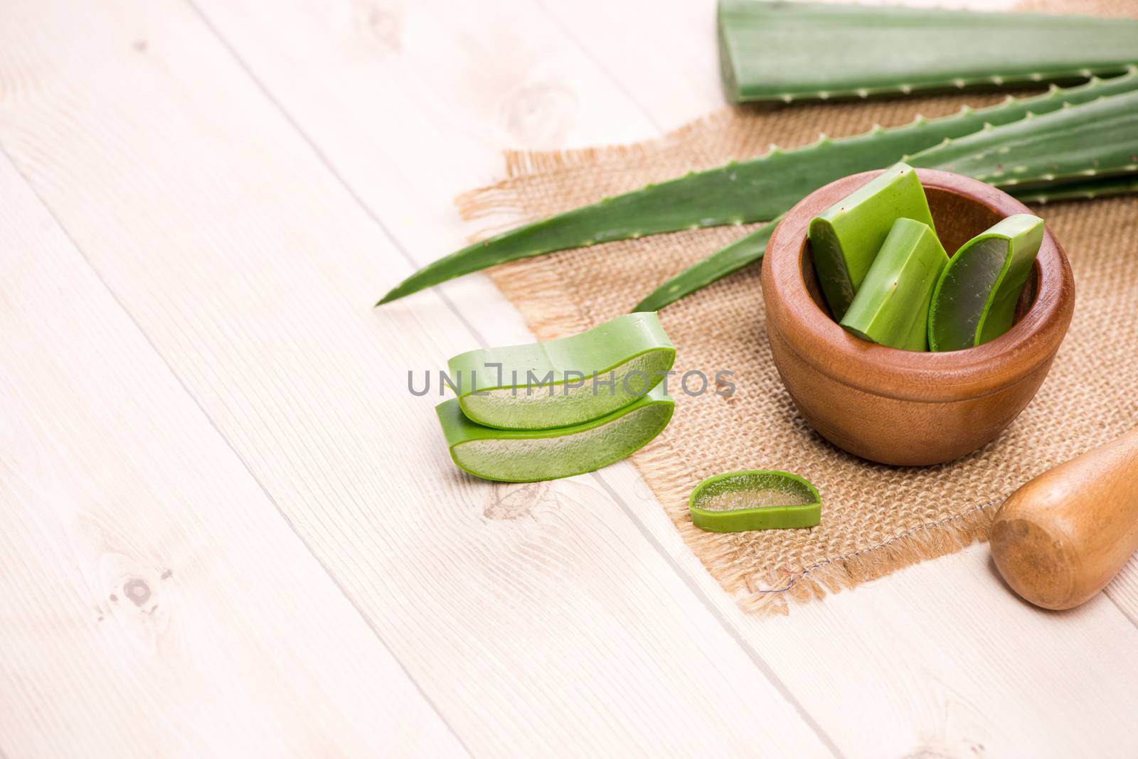 Aloe vera sliced and aloe leaves on a white background. by makidotvn