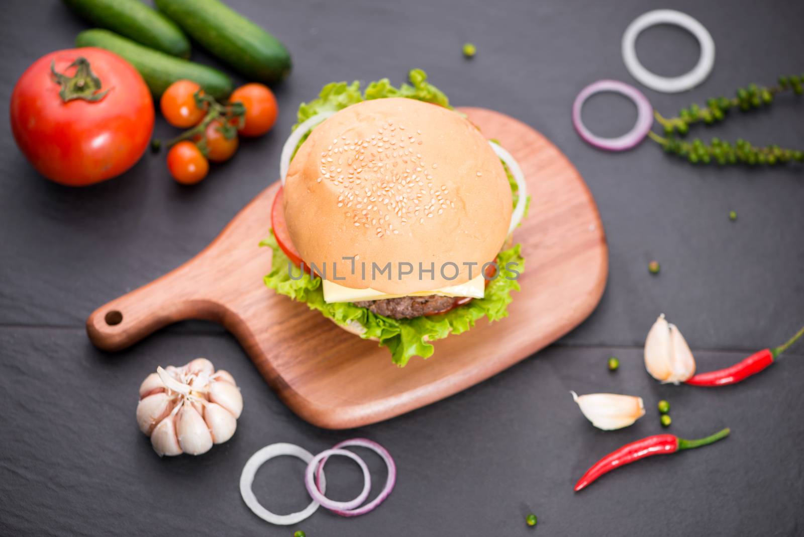 Delicious homemade burger on table. Top view, copy space, horizontal