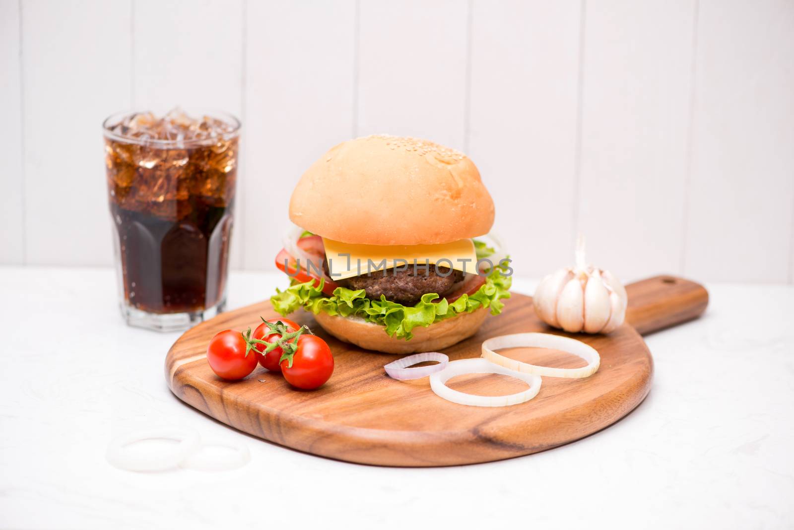 Homemade BBQ burger with coke on wooden background. by makidotvn
