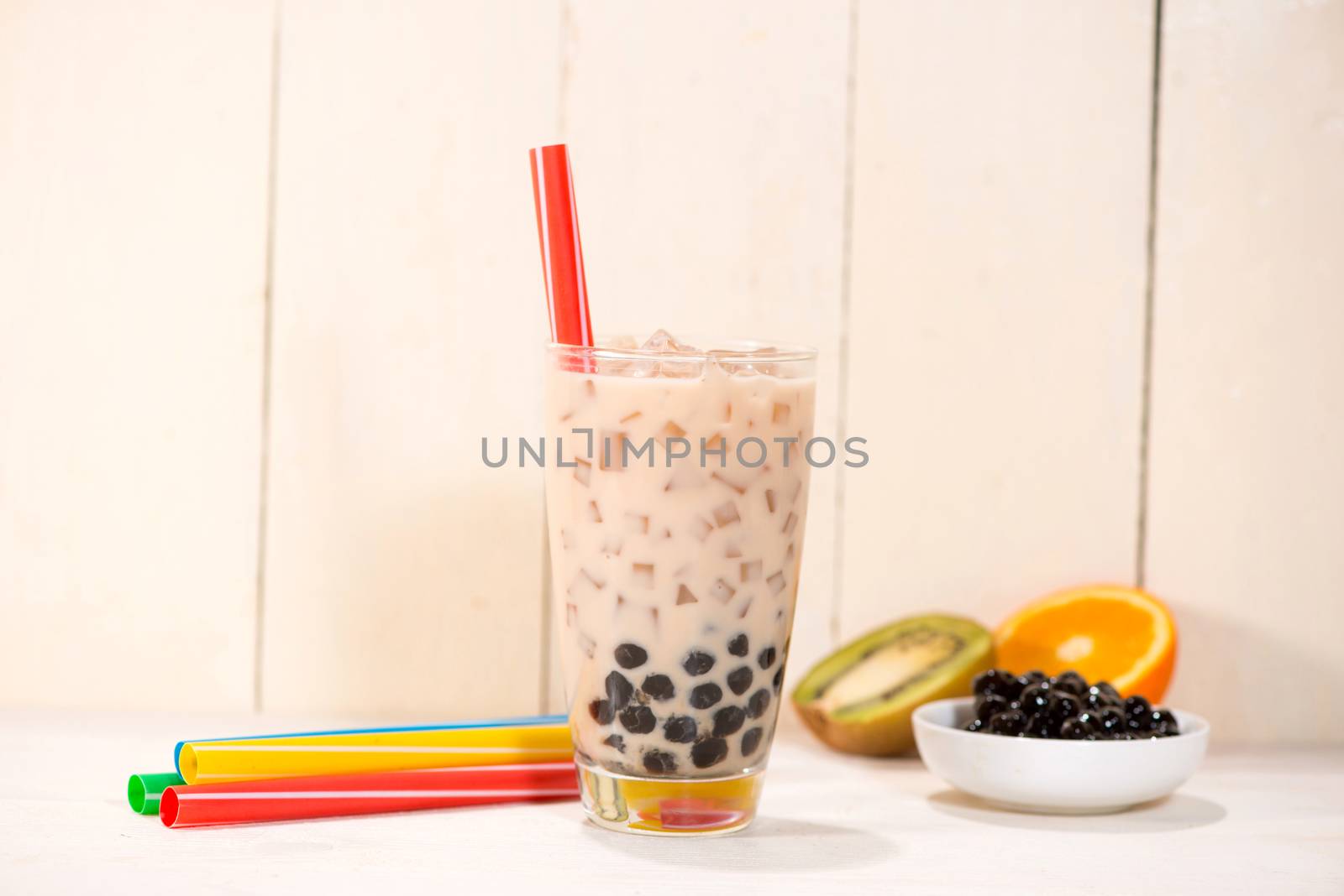 Boba / Bubble tea. Homemade Milk Tea with Pearls on wooden table by makidotvn