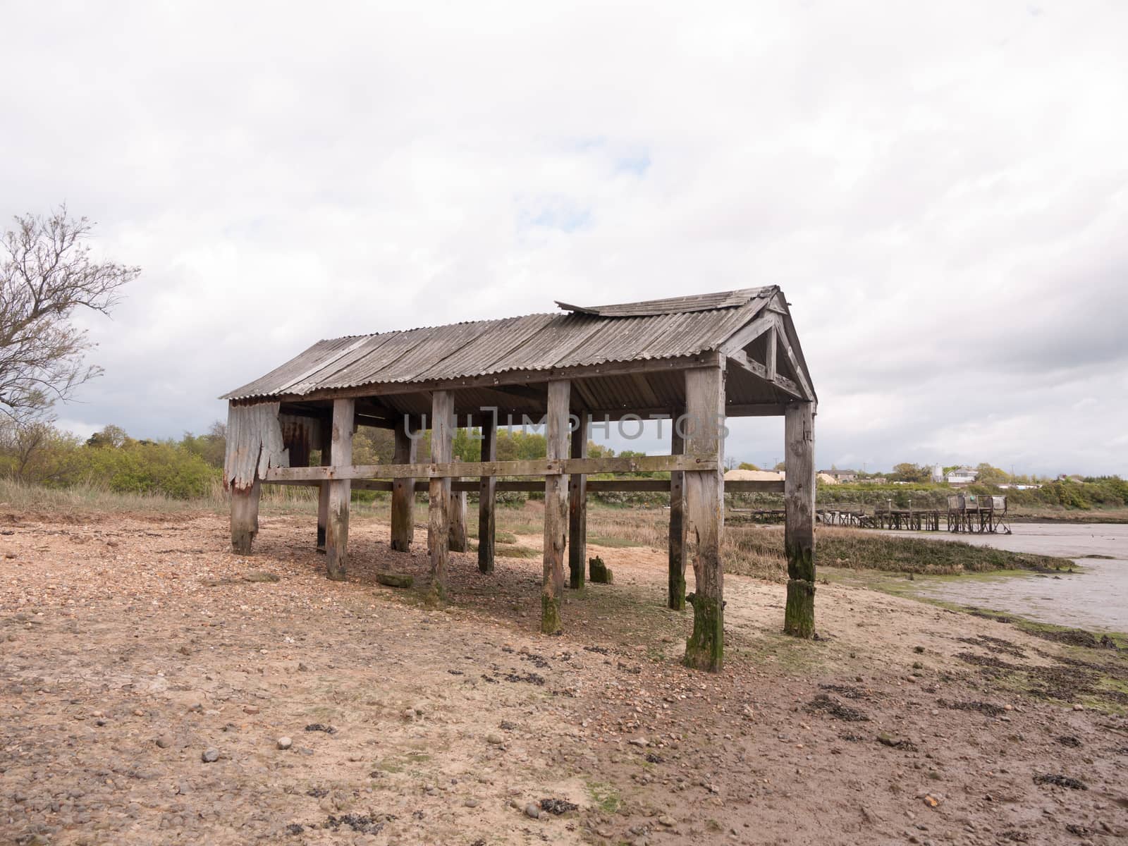 an old and abandoned sea shack shed decaying and rotting by callumrc