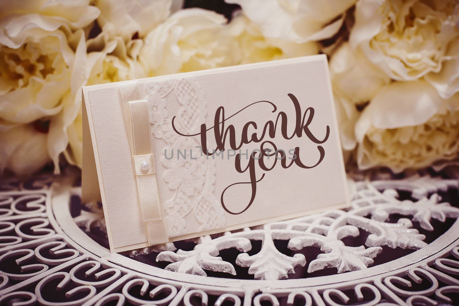 empty card to place text surrounded by flowers with text Thank you. Calligraphy lettering hand draw.