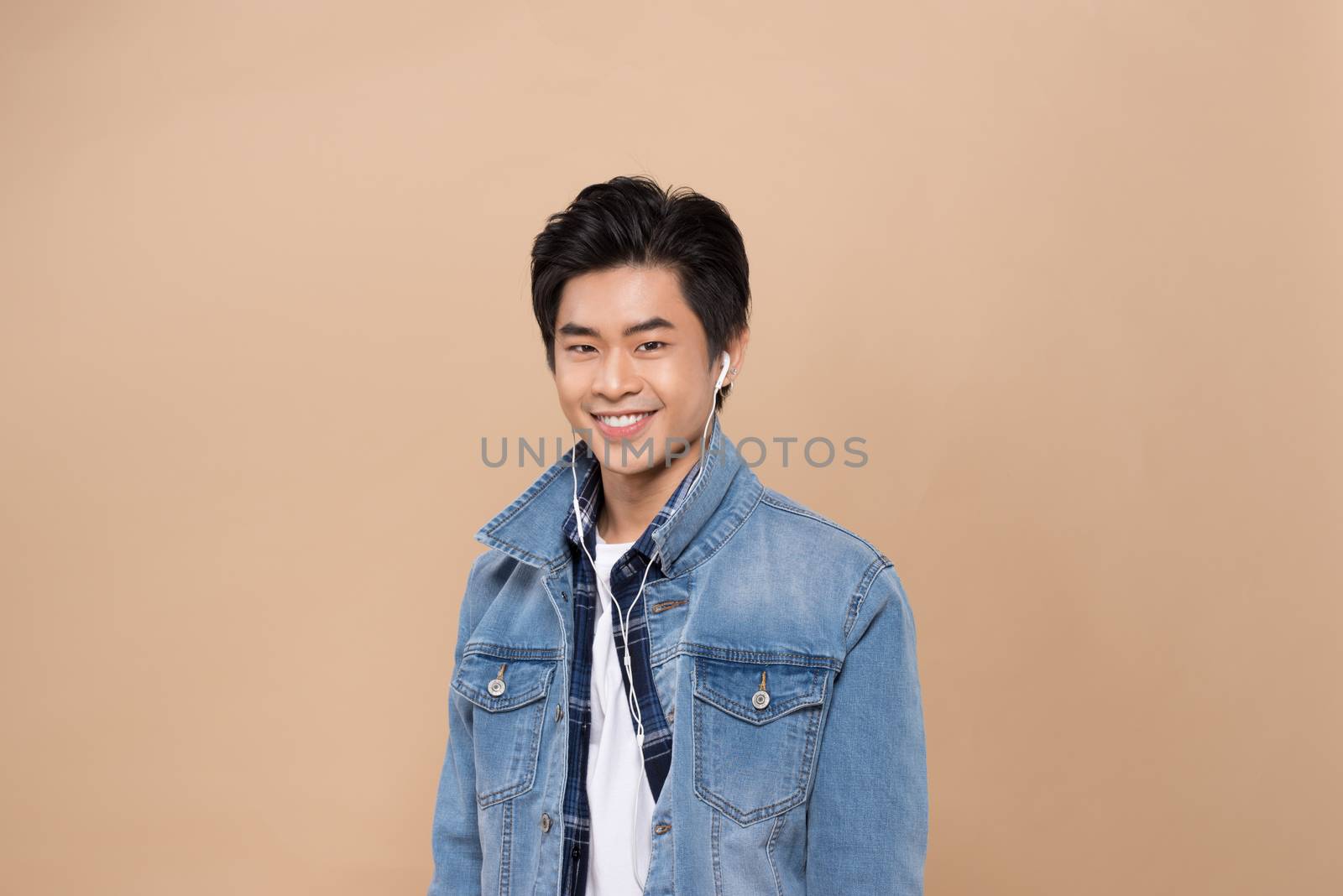 Attractive smiling young asian man