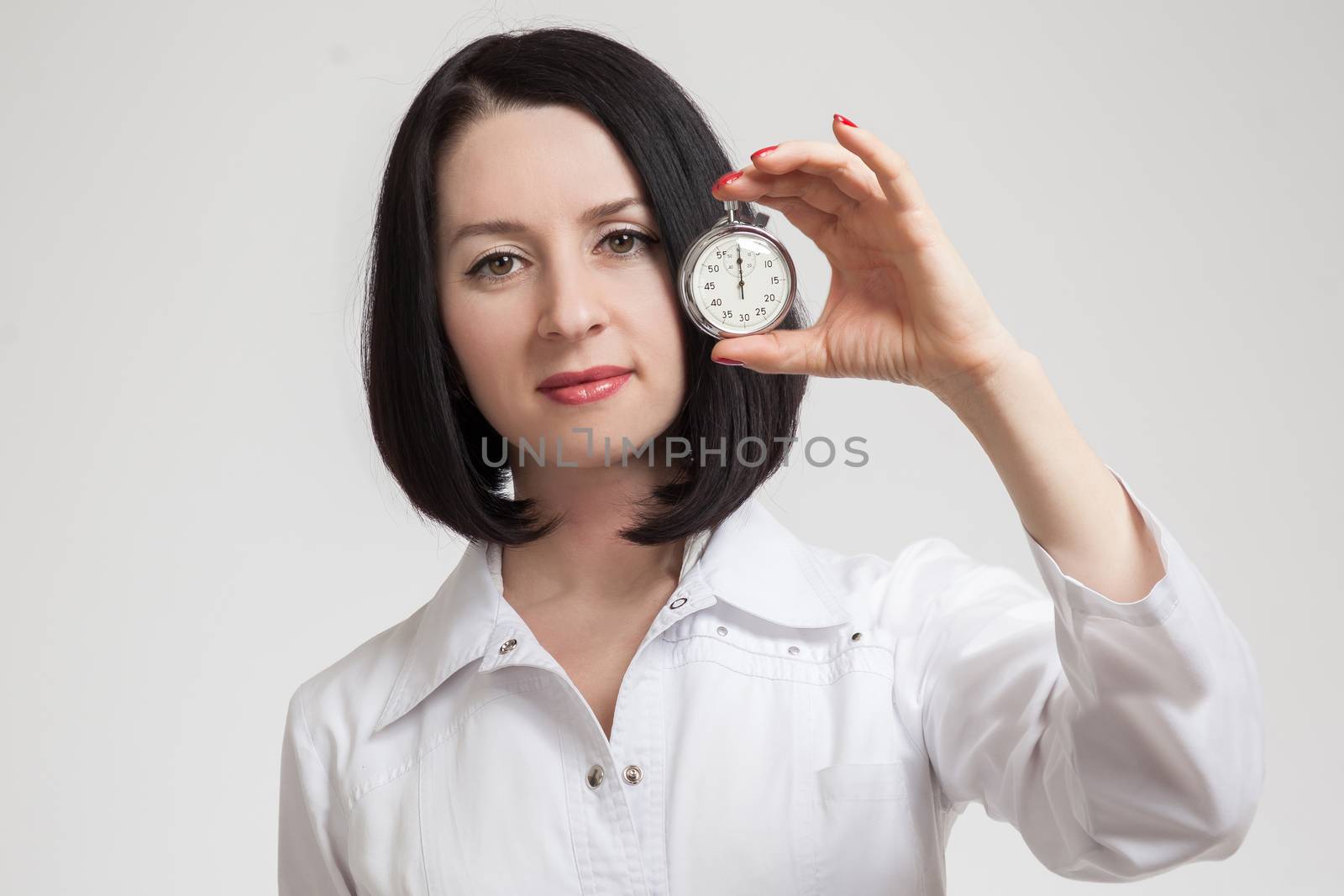 the beautiful woman the doctor with a stop watch  by sveter