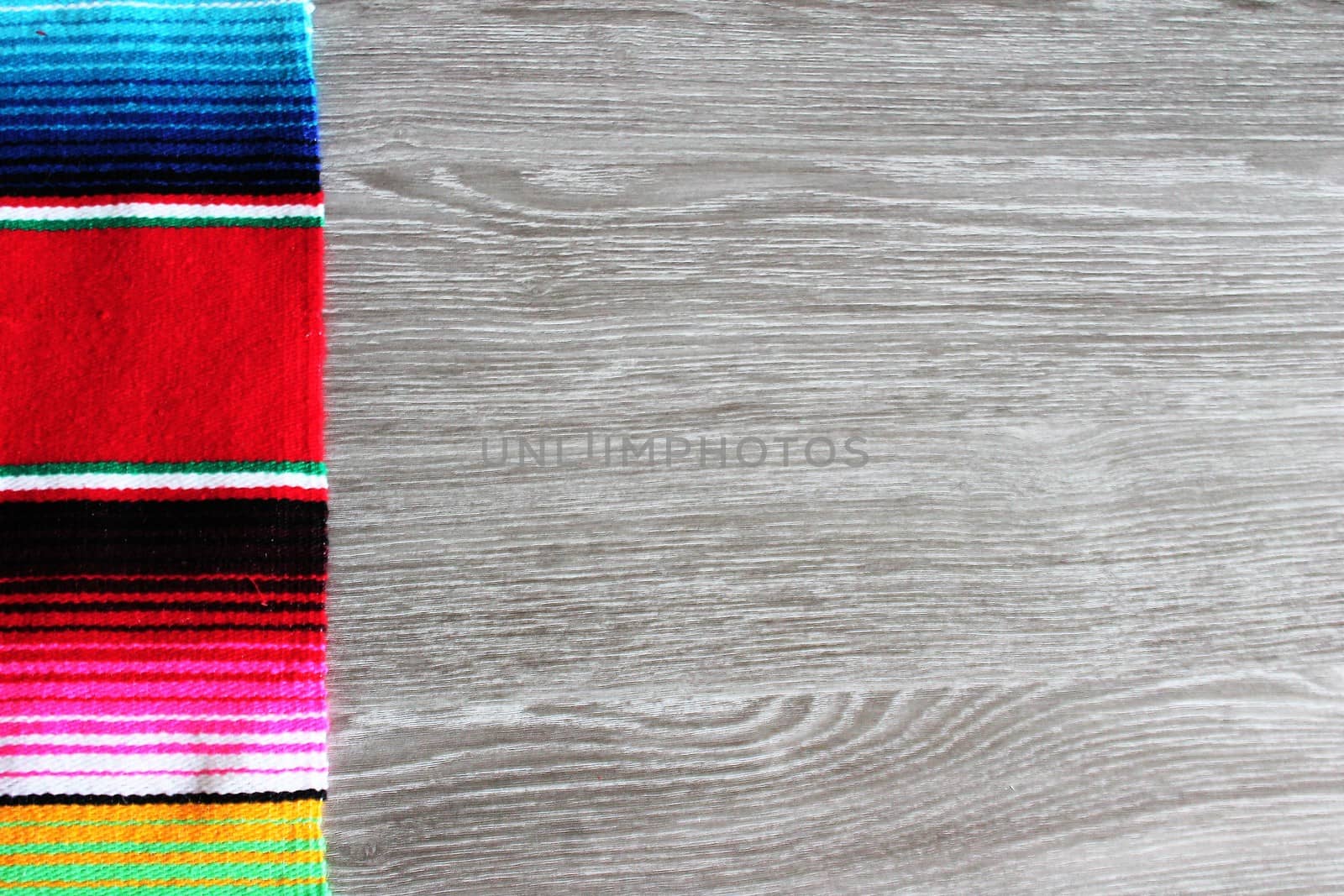 poncho serape background Mexican cinco de mayo fiesta wooden copy space