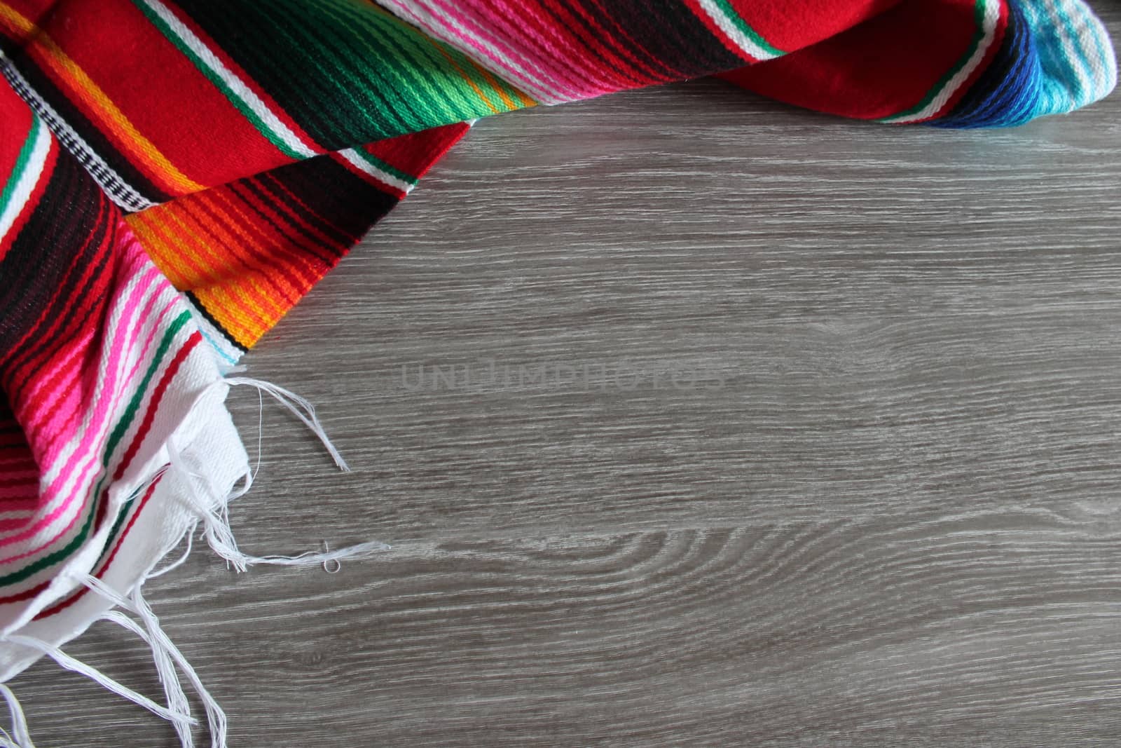 poncho serape background Mexican cinco de mayo fiesta wooden copy space