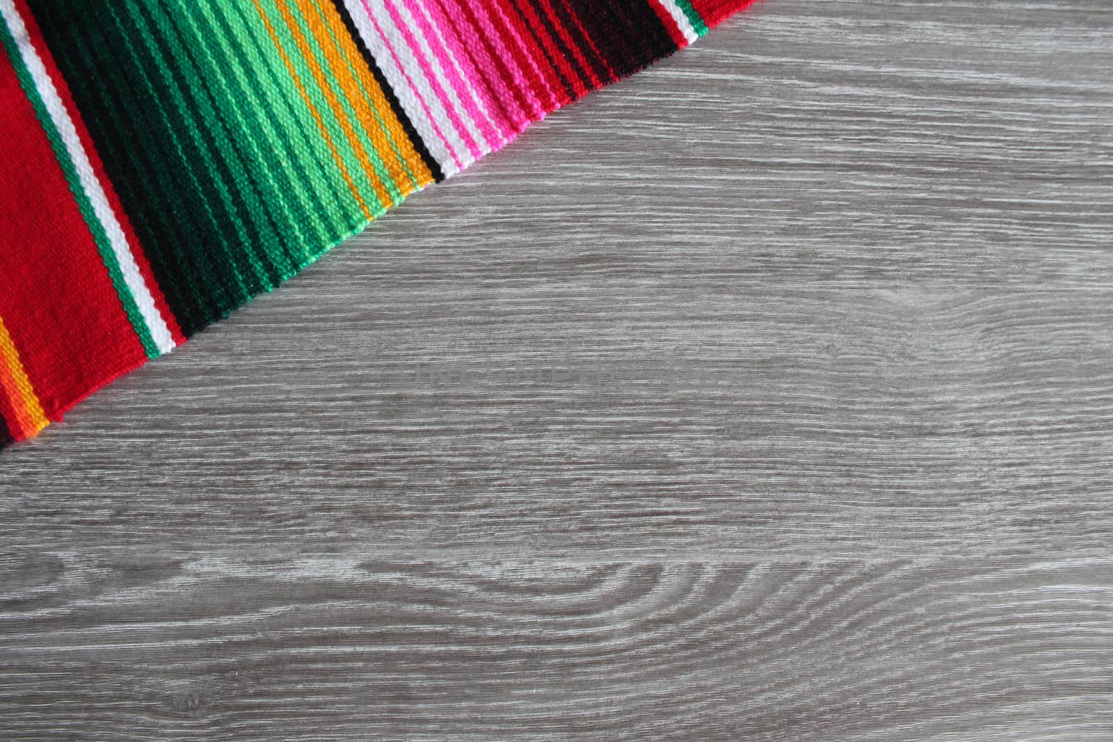 poncho serape background Mexican cinco de mayo fiesta wooden copy space