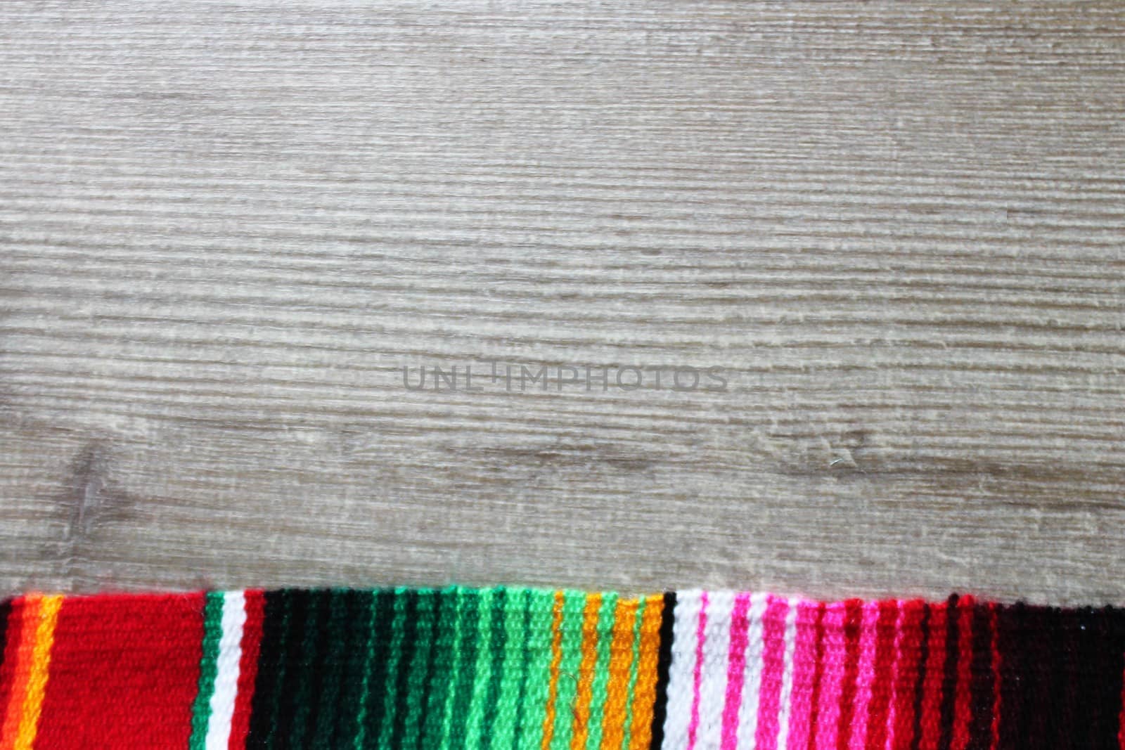 poncho serape background Mexican cinco de mayo fiesta wooden copy space by cheekylorns