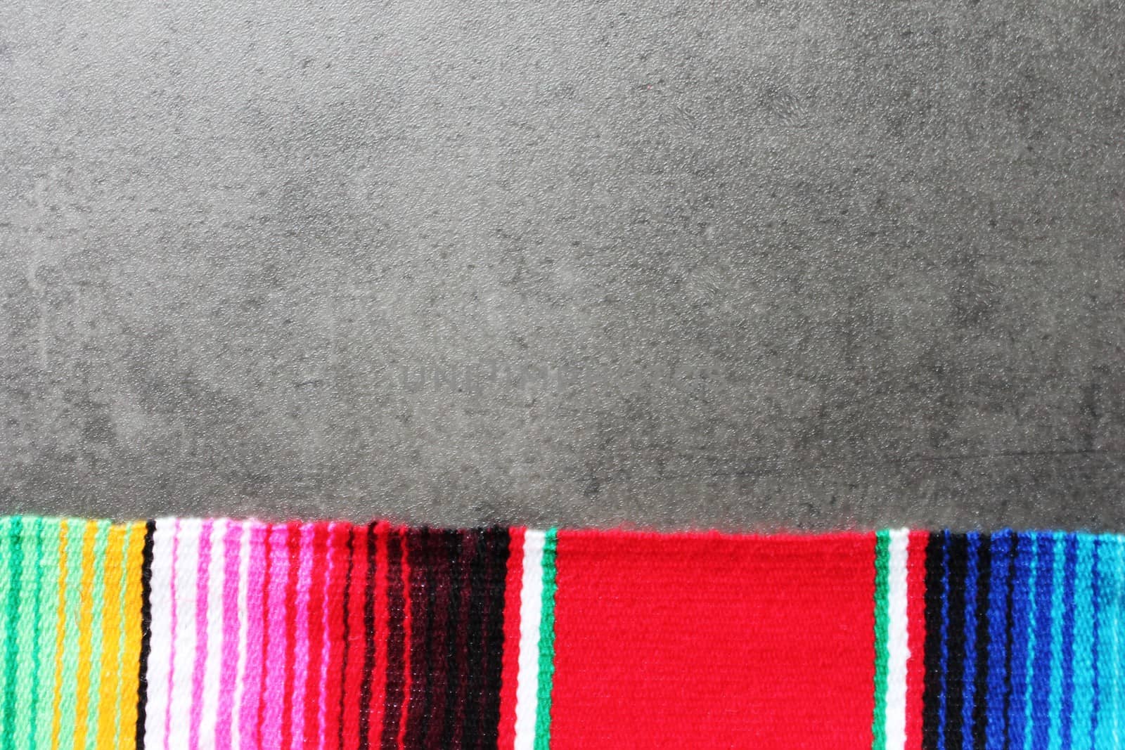 poncho serape background Mexican cinco de mayo fiesta wooden copy space by cheekylorns