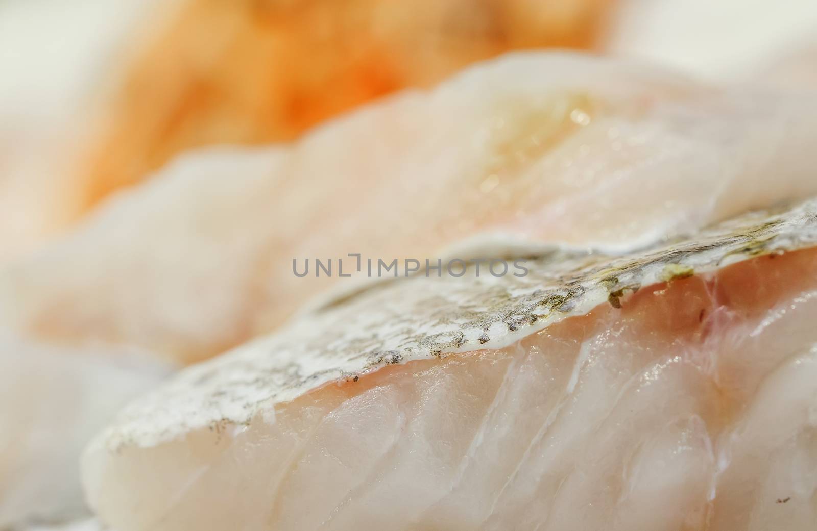 fresh cod back on showcase of seafood market. by pixinoo