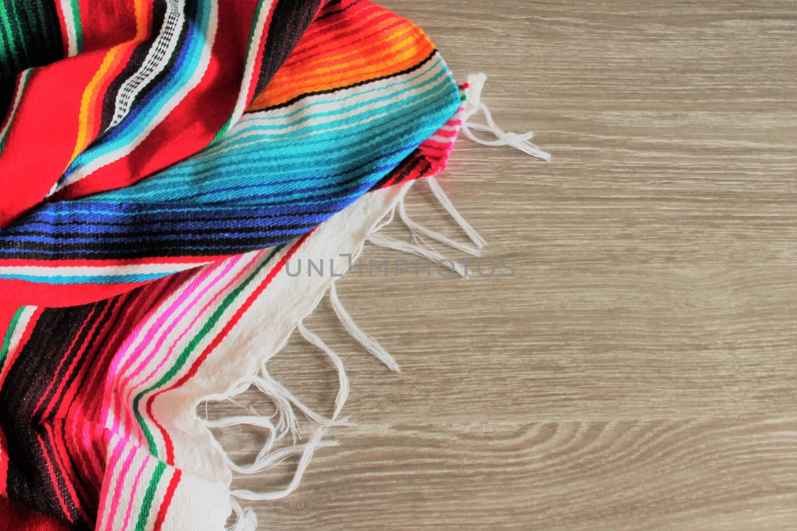 poncho serape background Mexican cinco de mayo fiesta wooden copy space