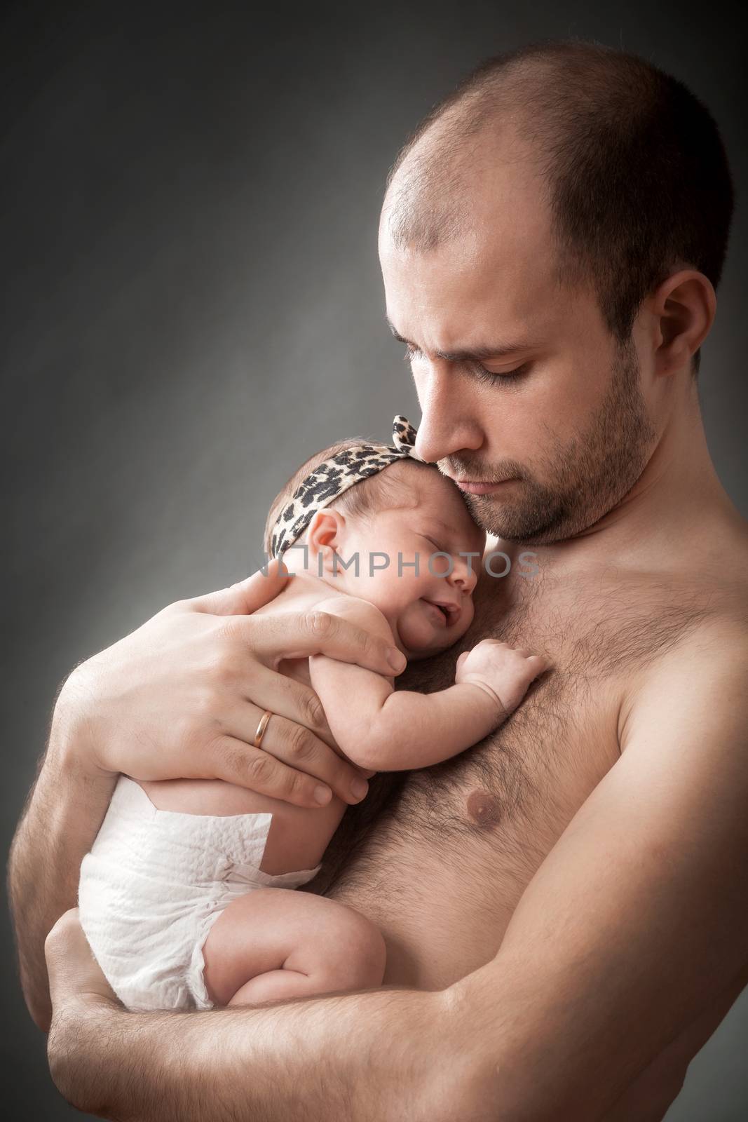 newborn child and father by sveter