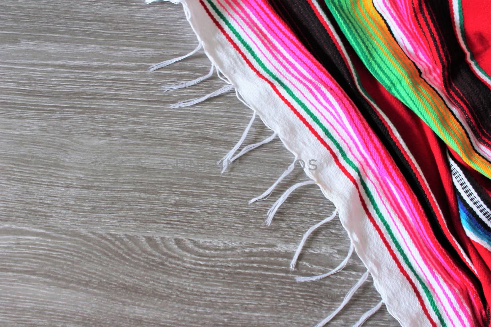 poncho serape background Mexican cinco de mayo fiesta wooden copy space