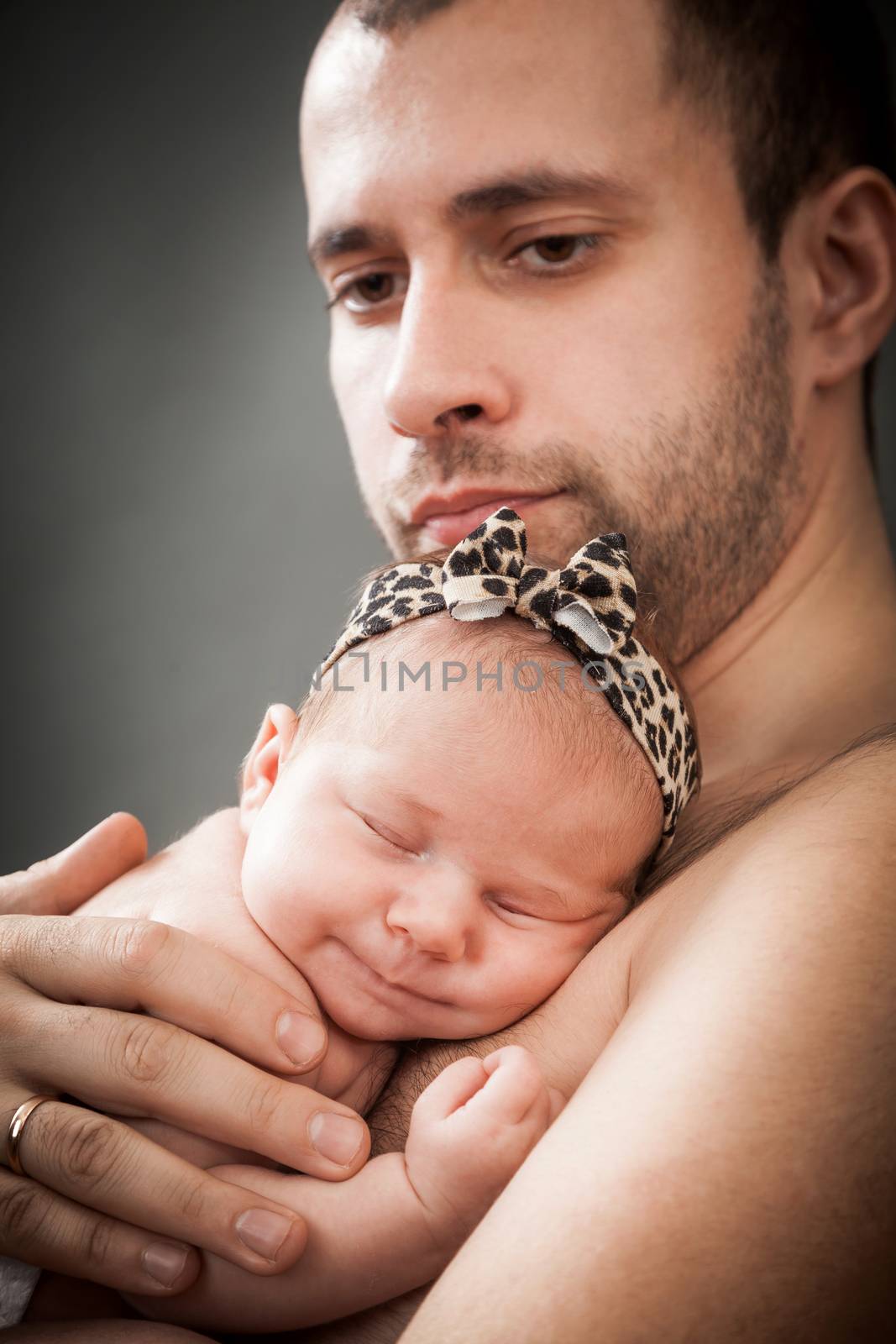 newborn child and father by sveter