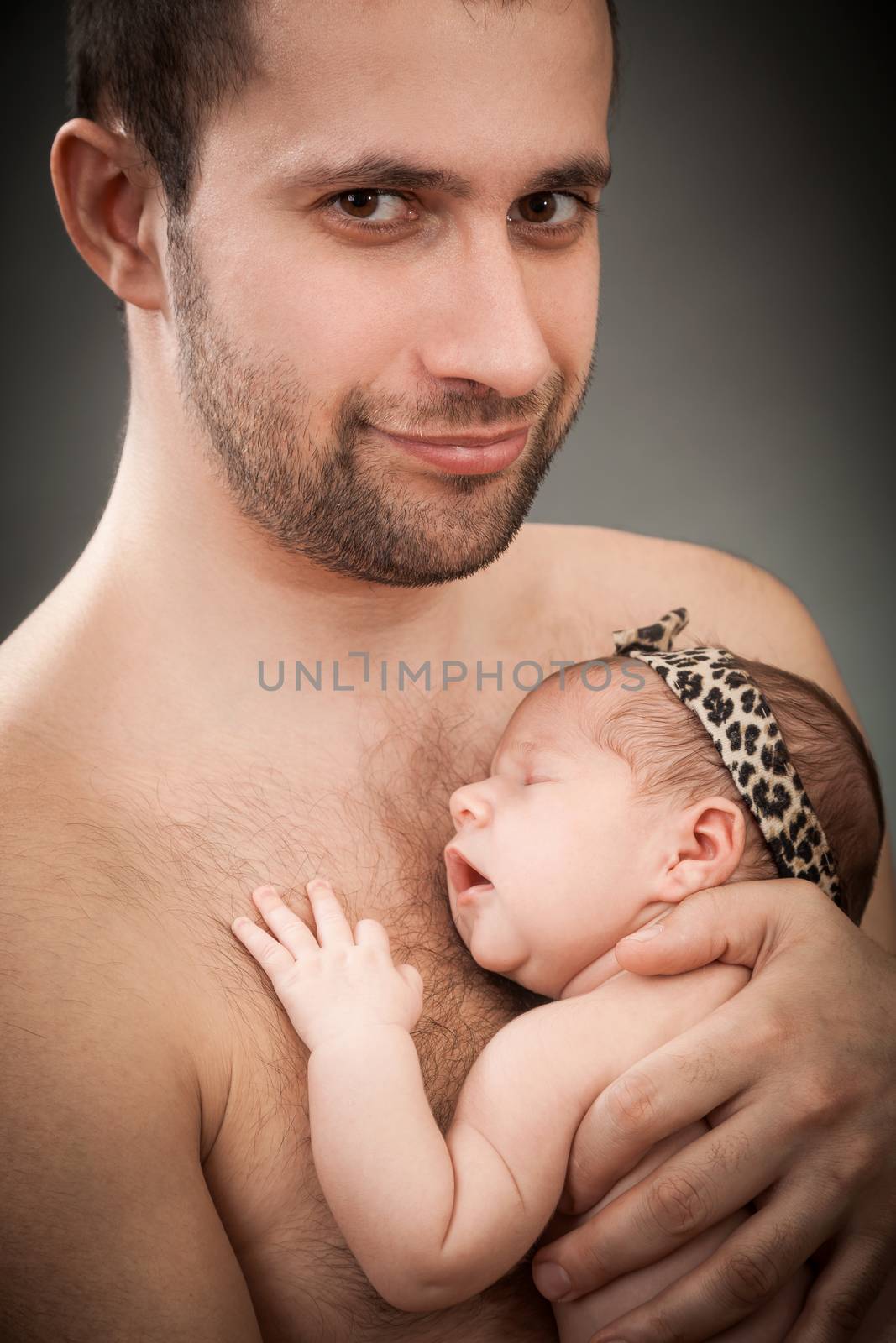 newborn child and father by sveter