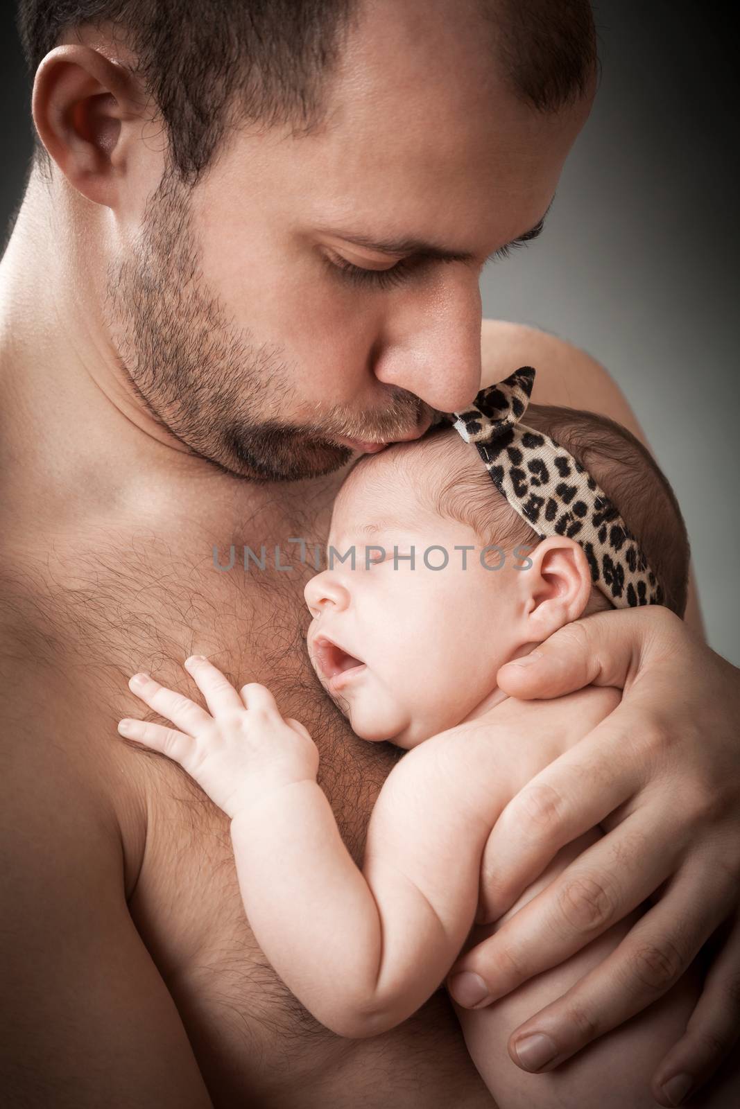 newborn child and father by sveter