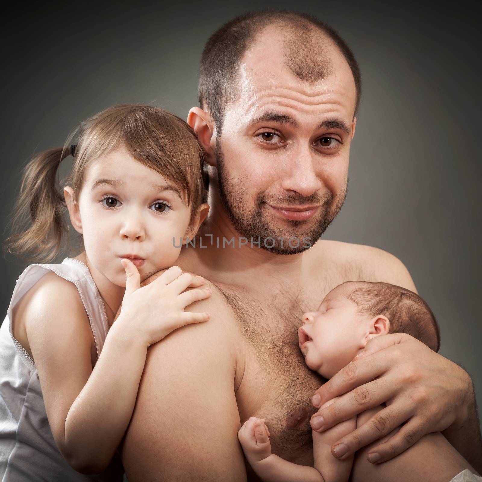 father with the daughter and newborn child