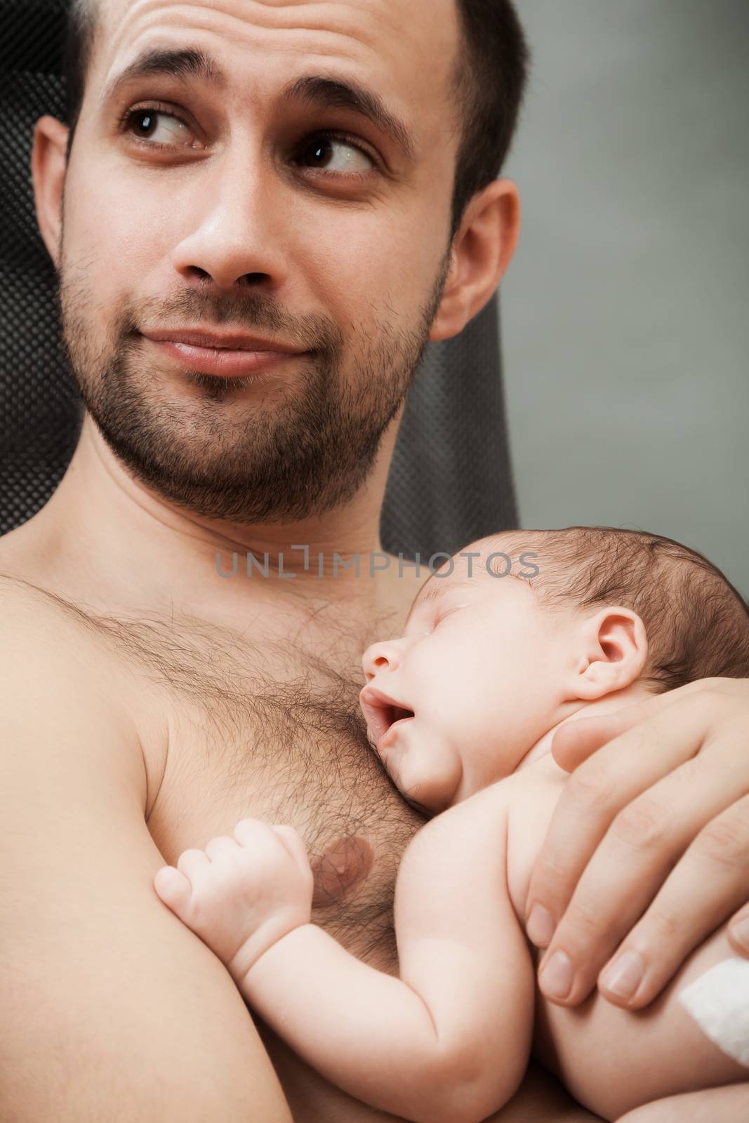 newborn child and father by sveter