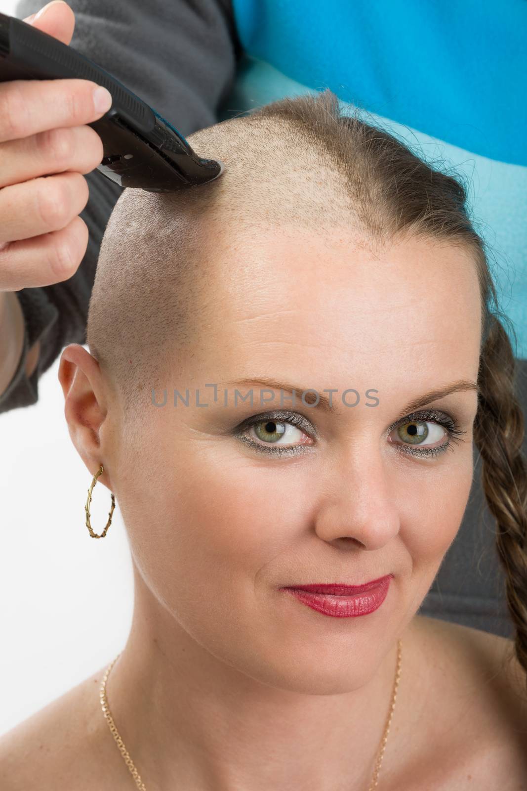 Portrait of beautiful middle age woman sad patient with cancer shaving heads, hope in healing. She lost her hair