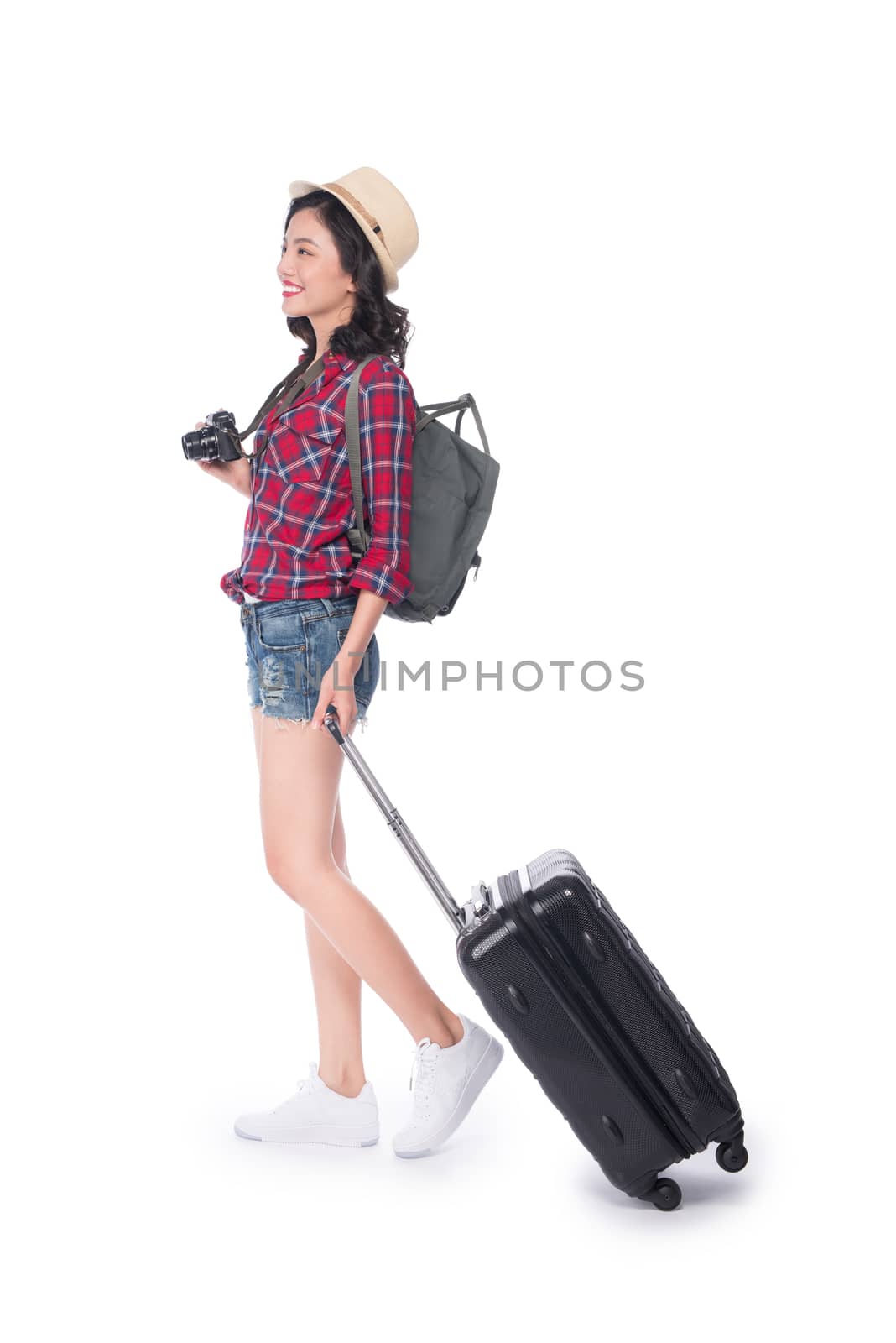 Woman travel. Young beautiful asian woman traveler with suitcase and camera on white background