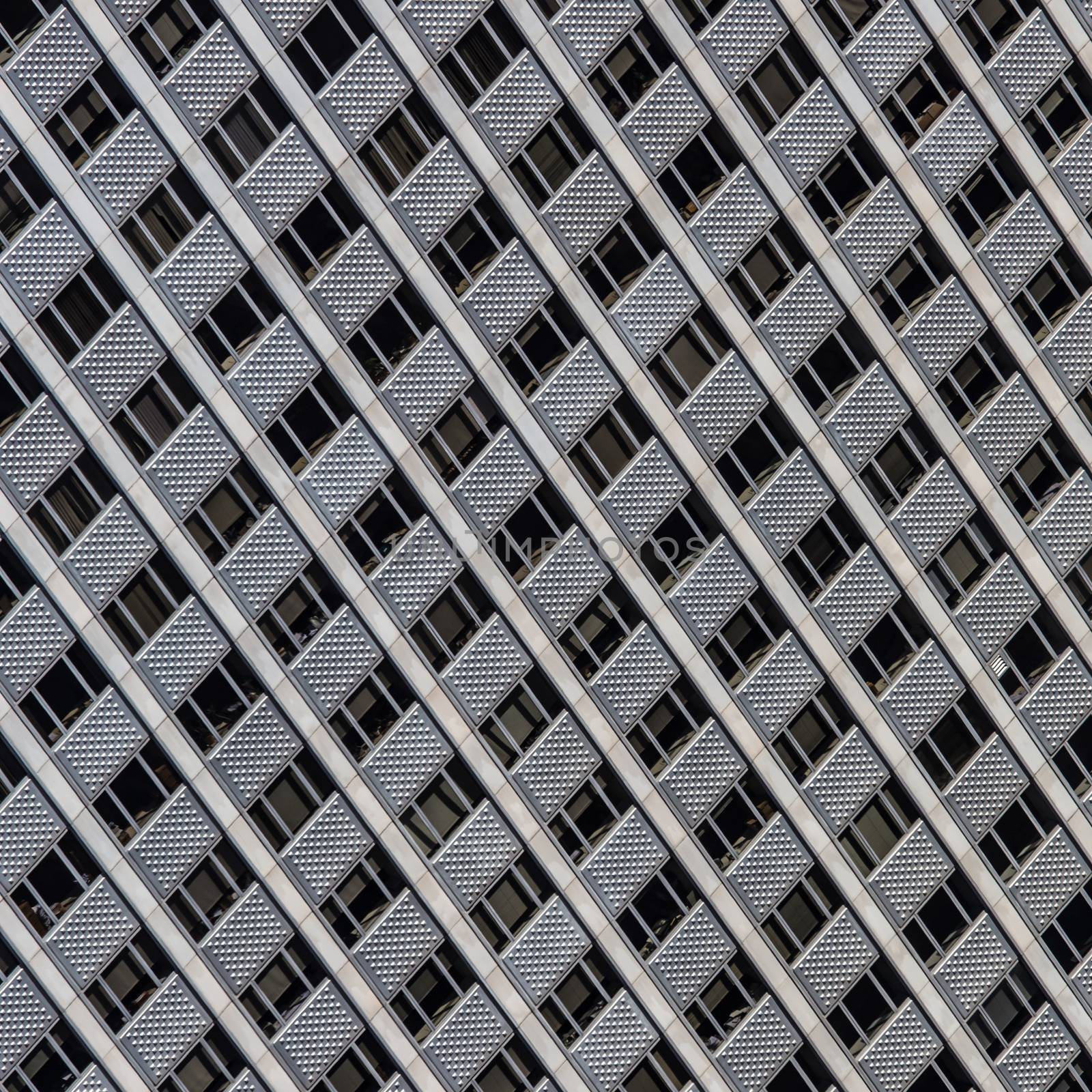 Windows of a modern office building. by kasto