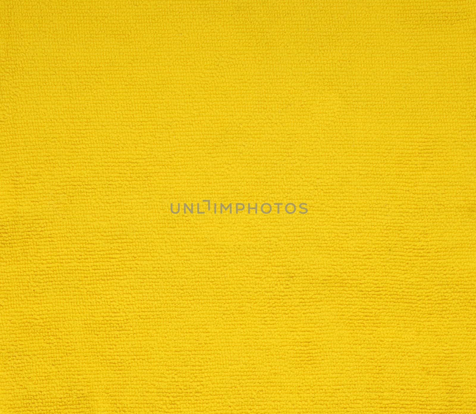 surface yellow fabric for background by phochi