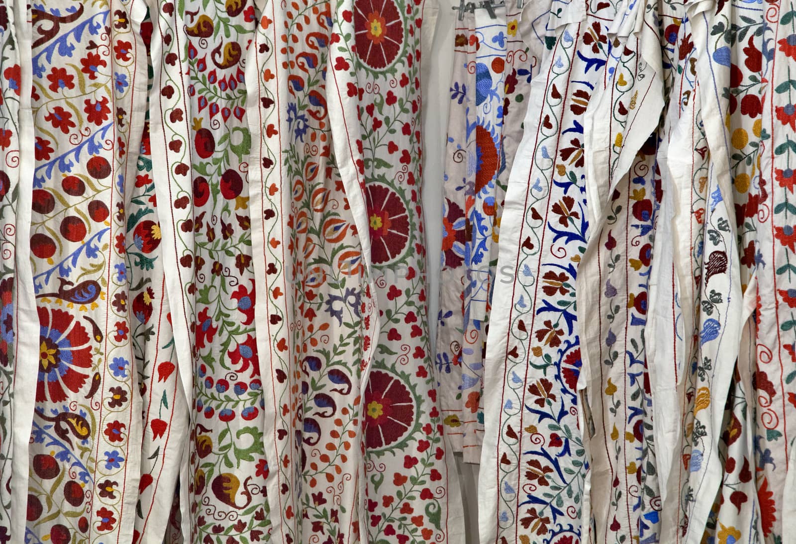 Traditional uzbek suzani embroidery fabrics at oriental bazaar, Bukhara, Uzbekistan