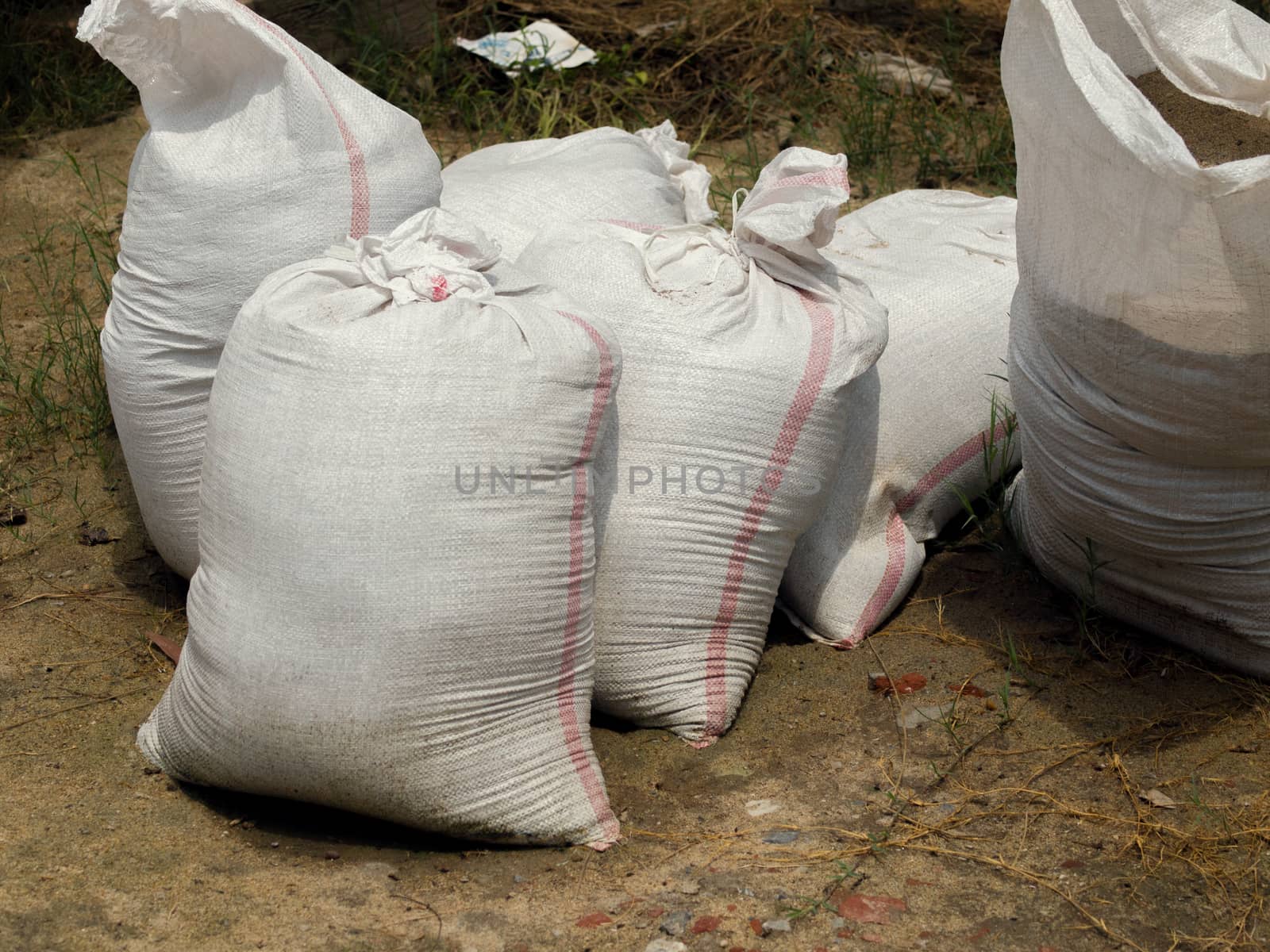 COLOR PHOTO OF SANDBAG OR SACK MADE OF HESSIAN (BURLAP) OR POLYPROPYLENE