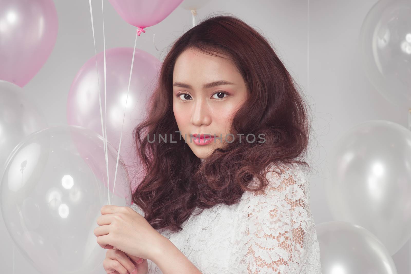 Asian beauty fashion woman with pastel balloons by makidotvn