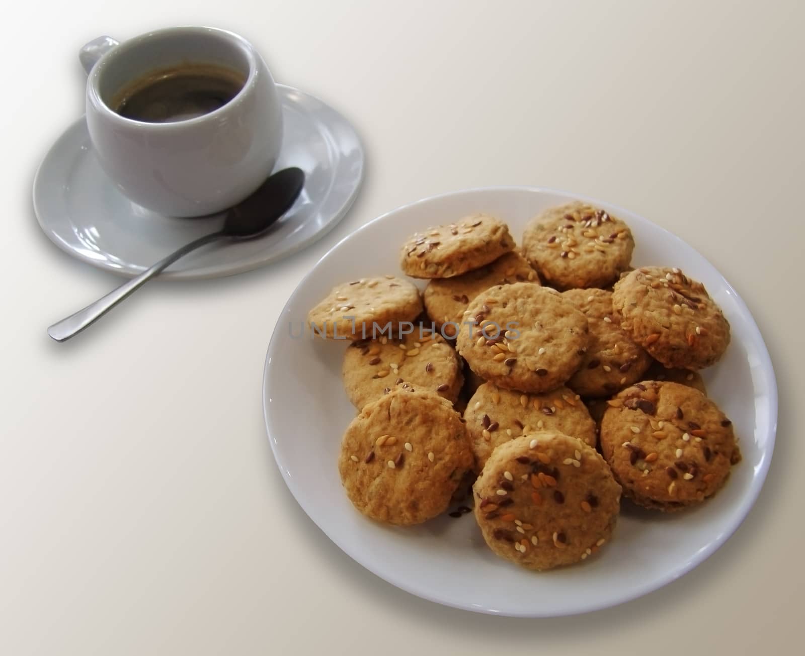 Coffee cup and cookie