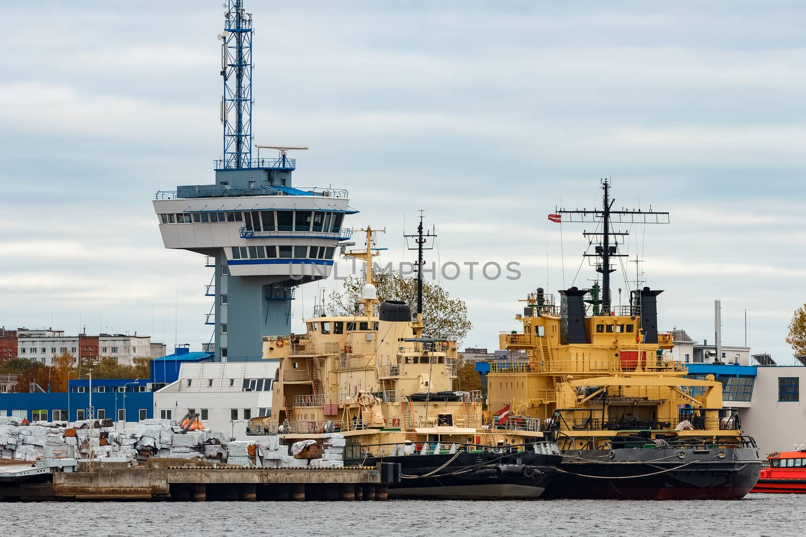 Yellow icebreakers moored at the port of Riga, Europe