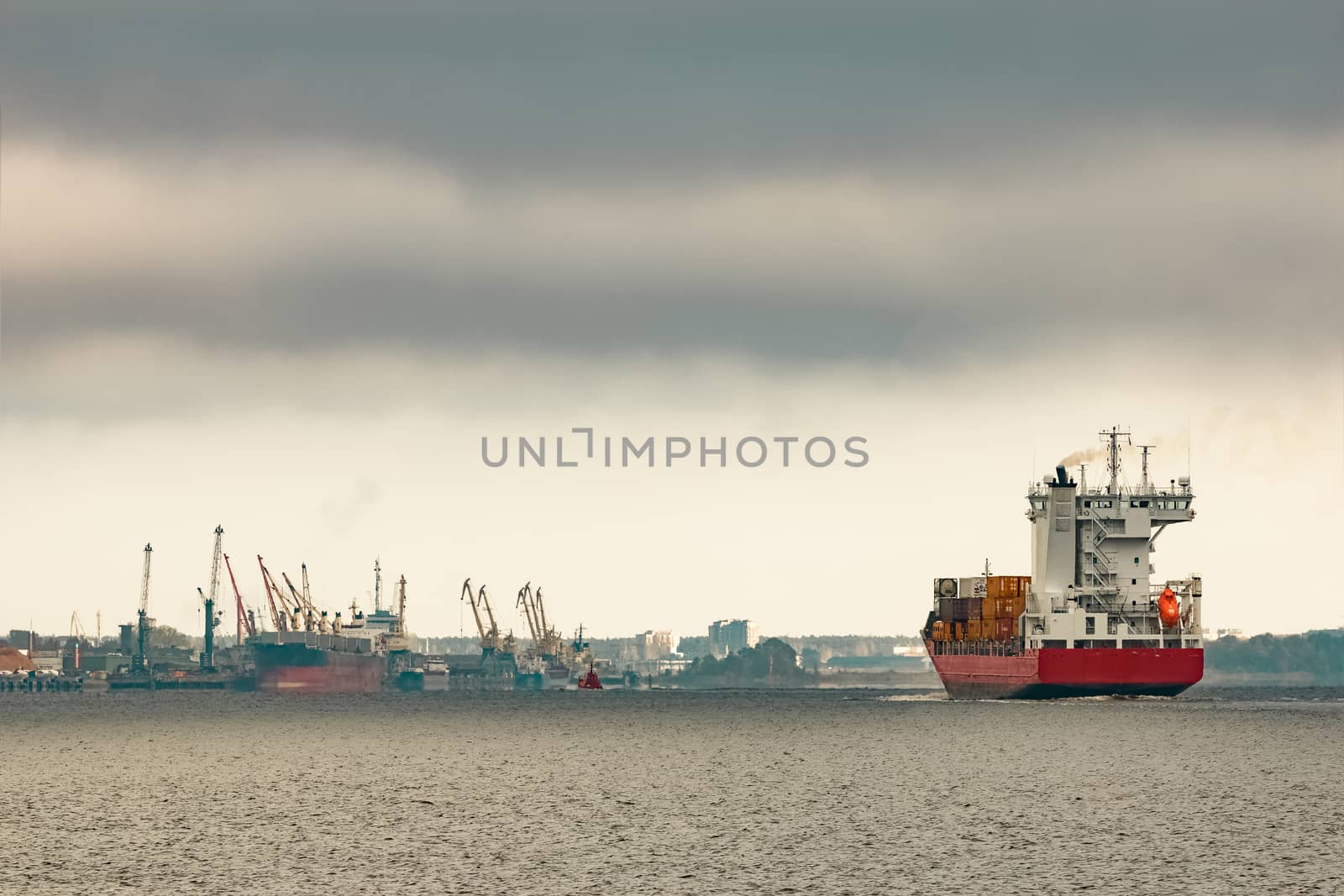 Red cargo container ship by sengnsp