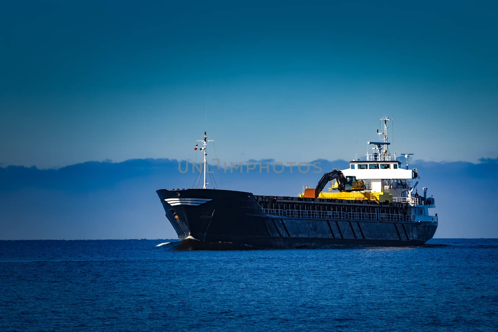 Black cargo ship by sengnsp