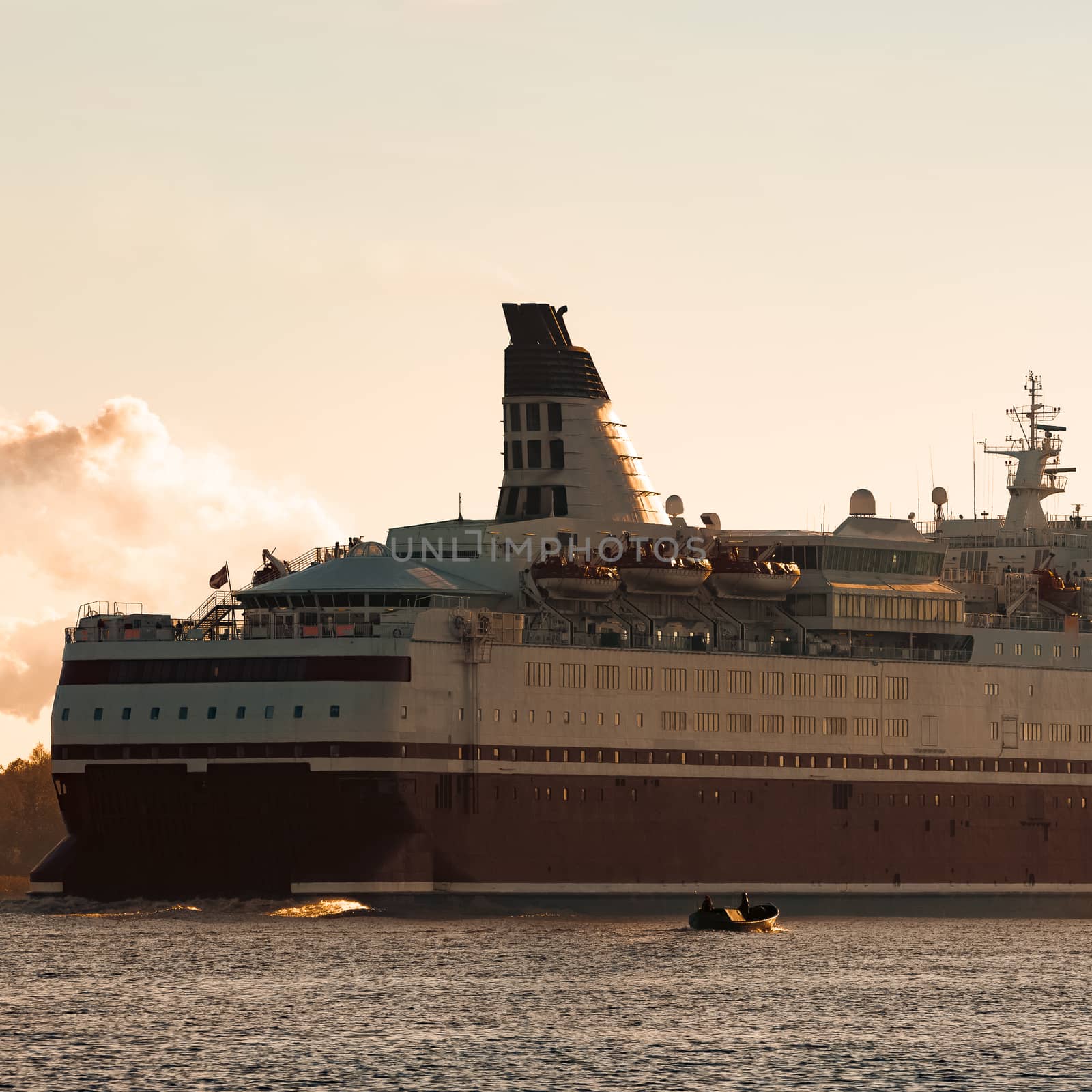 Big cruise liner. Passenger ferry ship entering Riga at morning