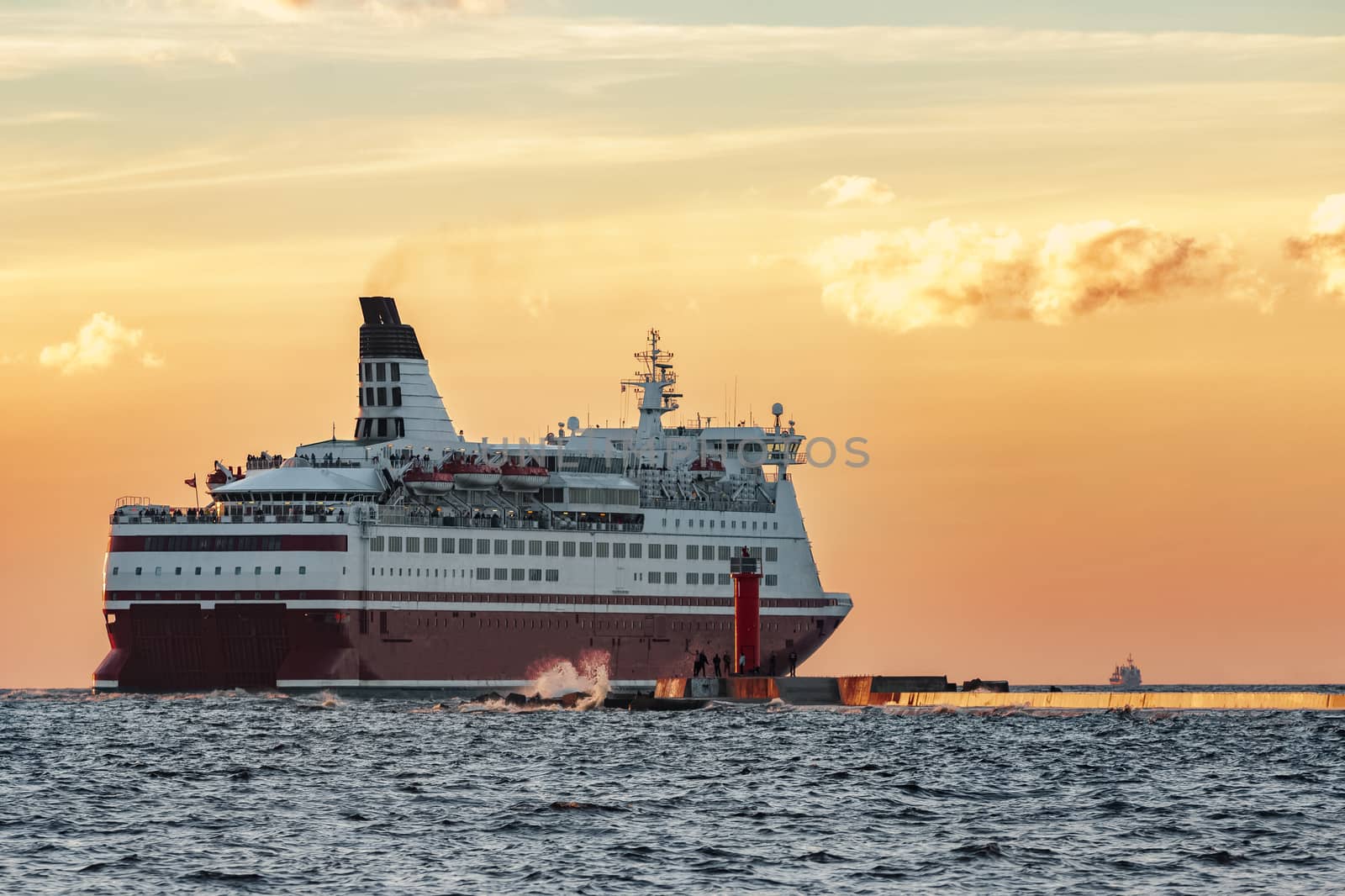 Red cruise liner. Passenger ferry sailing from Riga to Stockholm