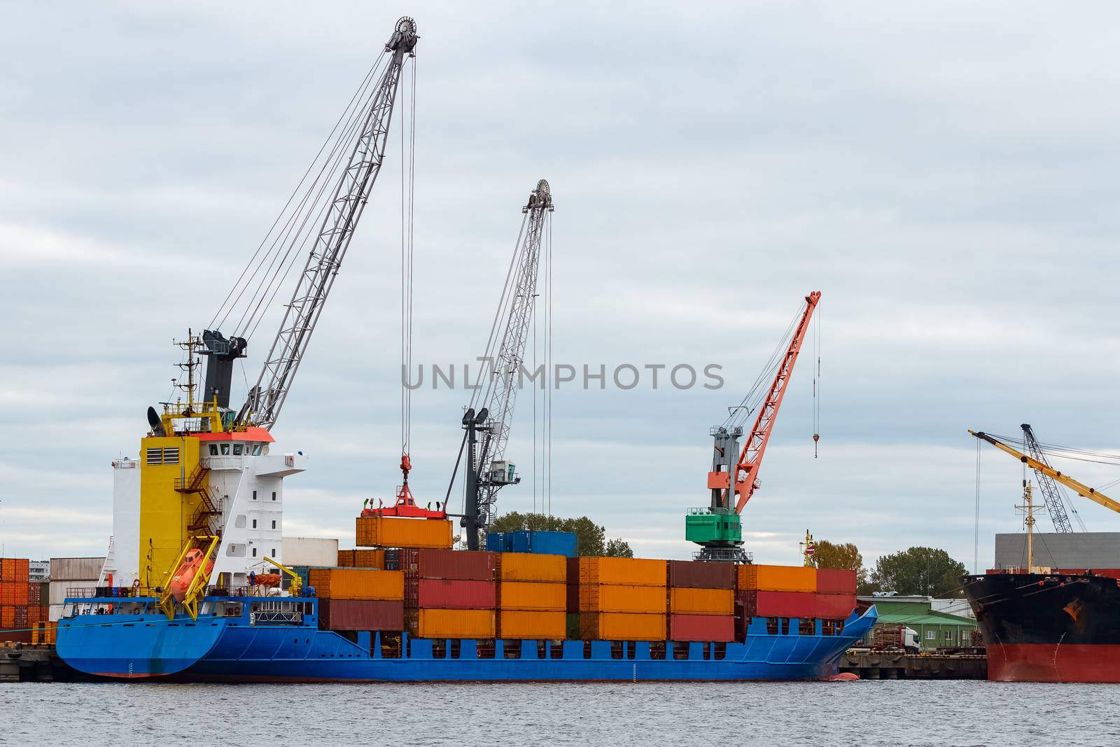 Blue container ship loading by sengnsp