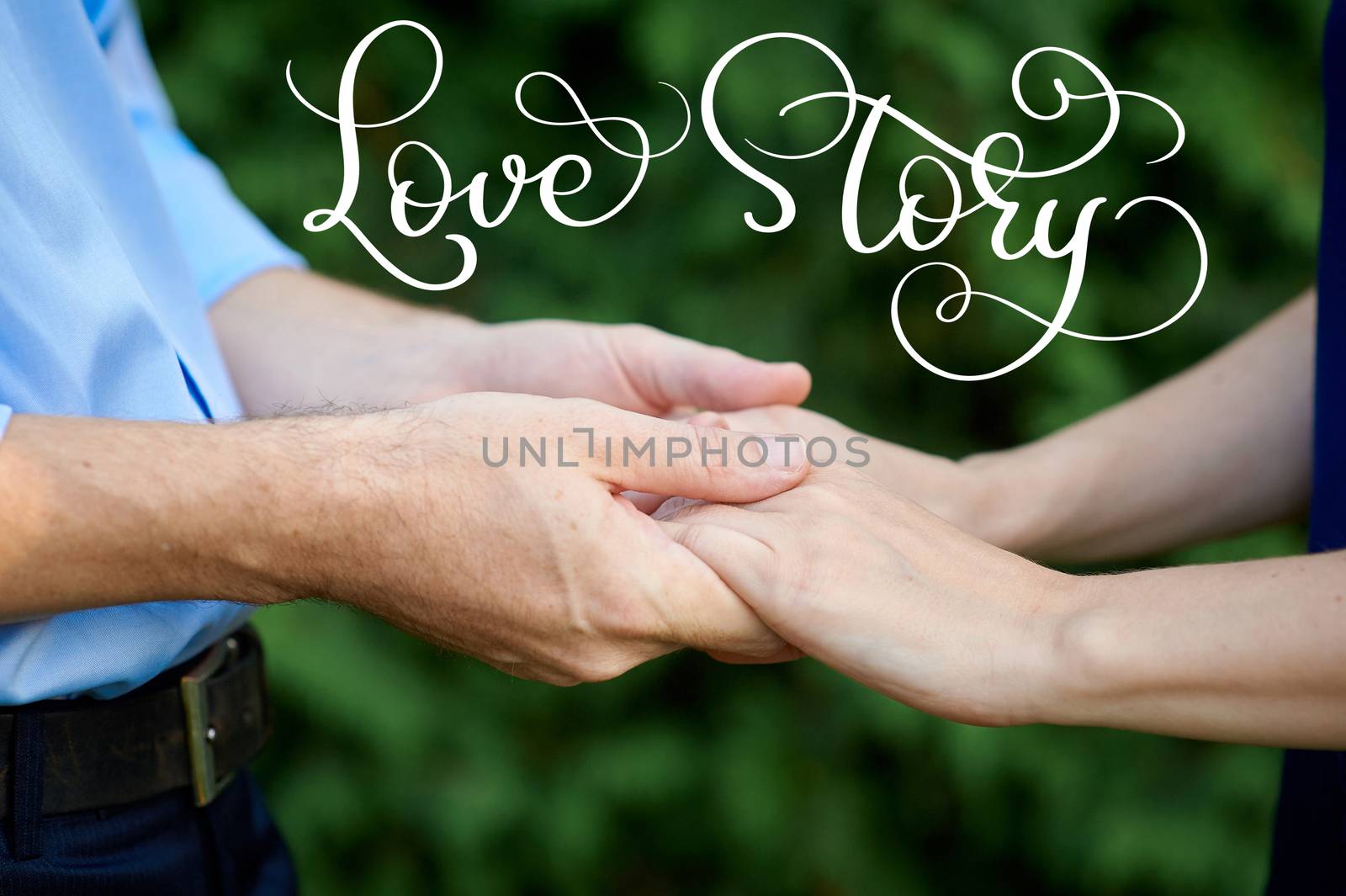 man is holding a woman hands for a walk in a summer park and vintage text Love story. Calligraphy lettering hand draw.
