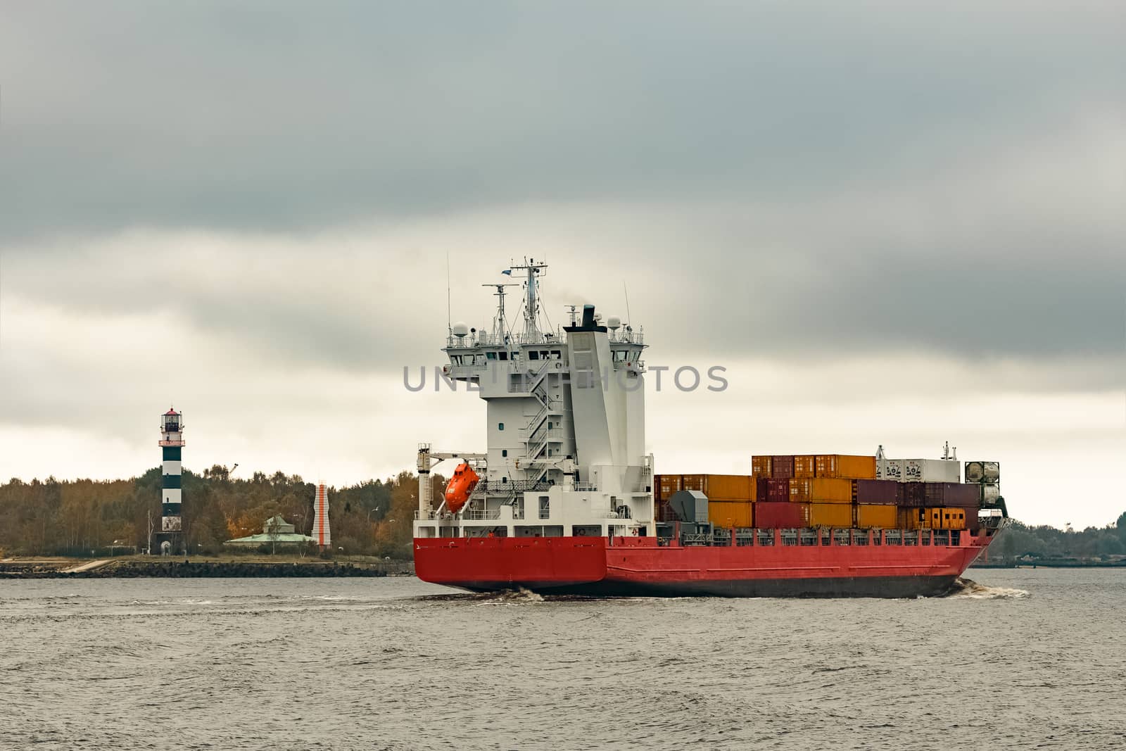Red cargo container ship by sengnsp