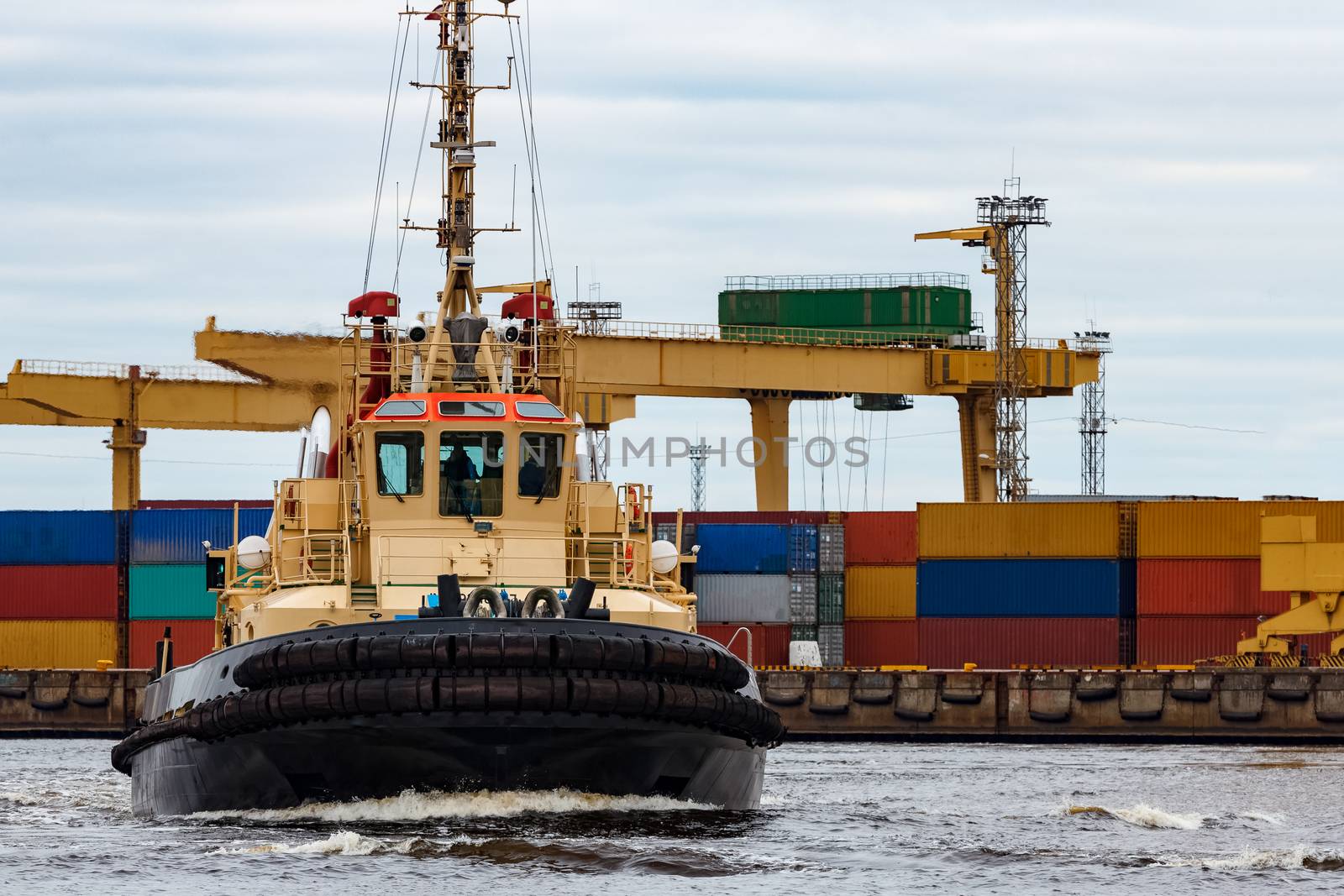 Tug ship in the cargo port of Riga, Europe