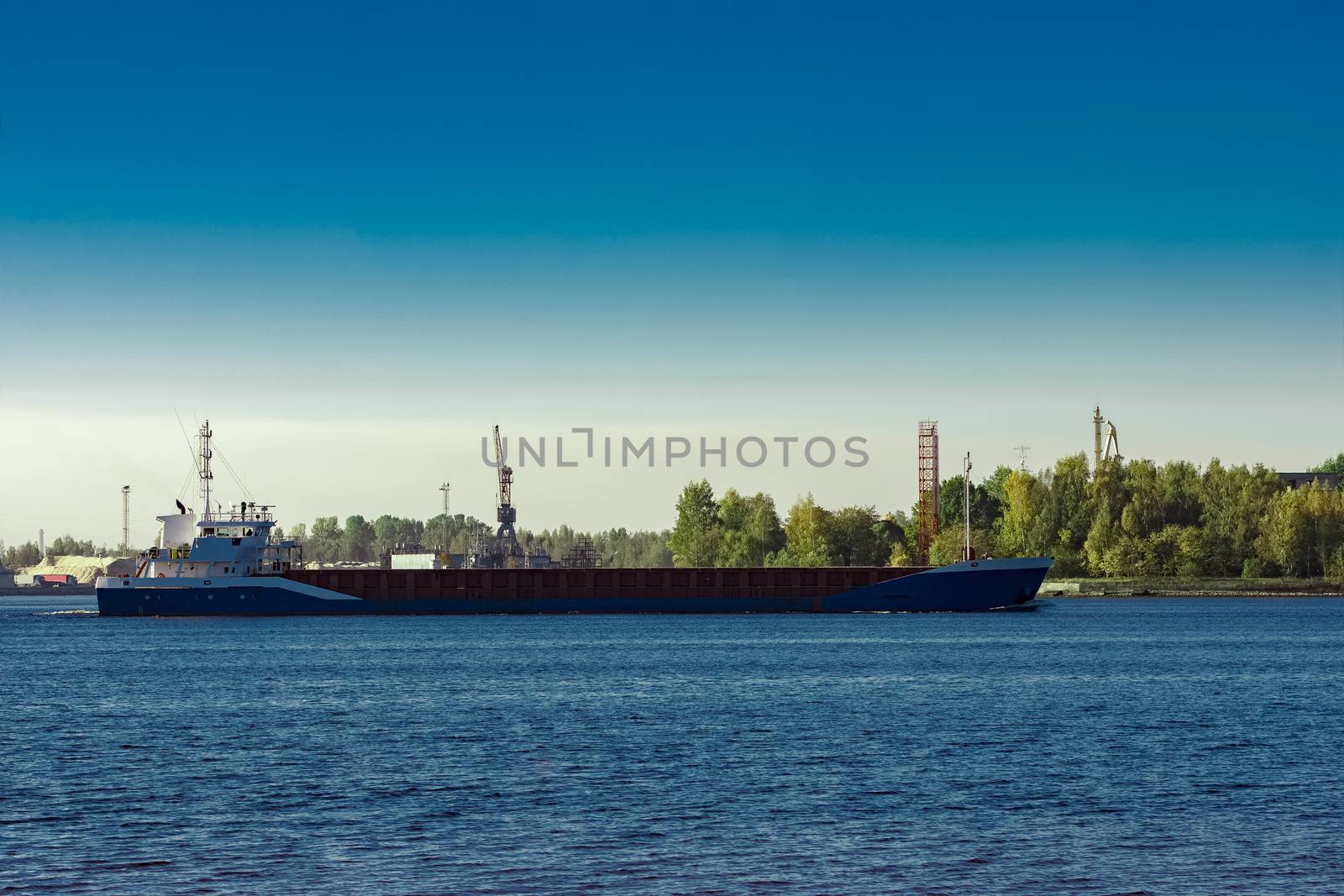 Blue cargo ship by sengnsp